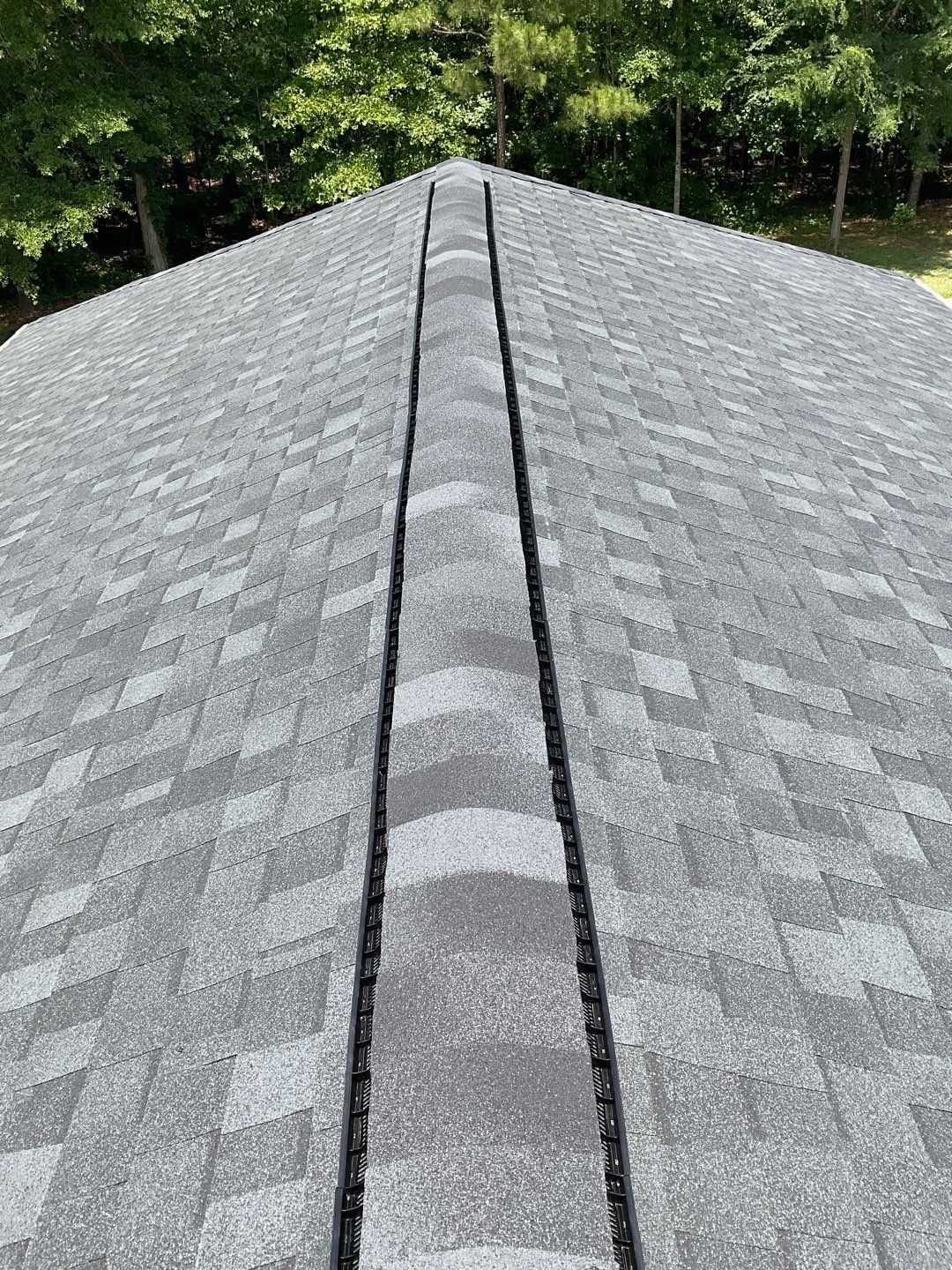 Residential Roofing Installation using Tamko Heritage lifetime shingle in Rustic Black by Sands Roofing & Construction