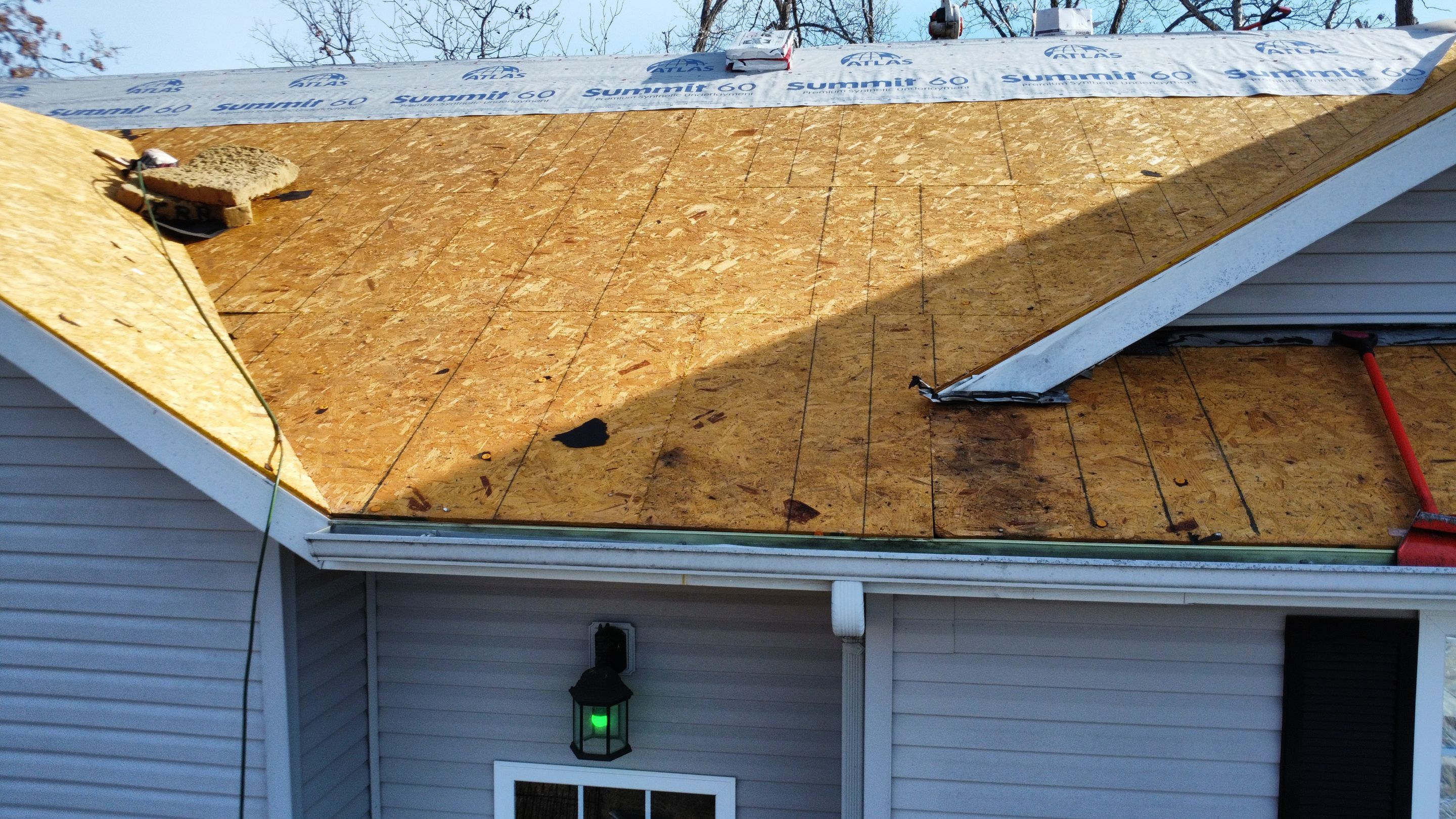 Residential Roof + Gutters & Downspouts Install  by Titan Commercial & Residential Roofing 