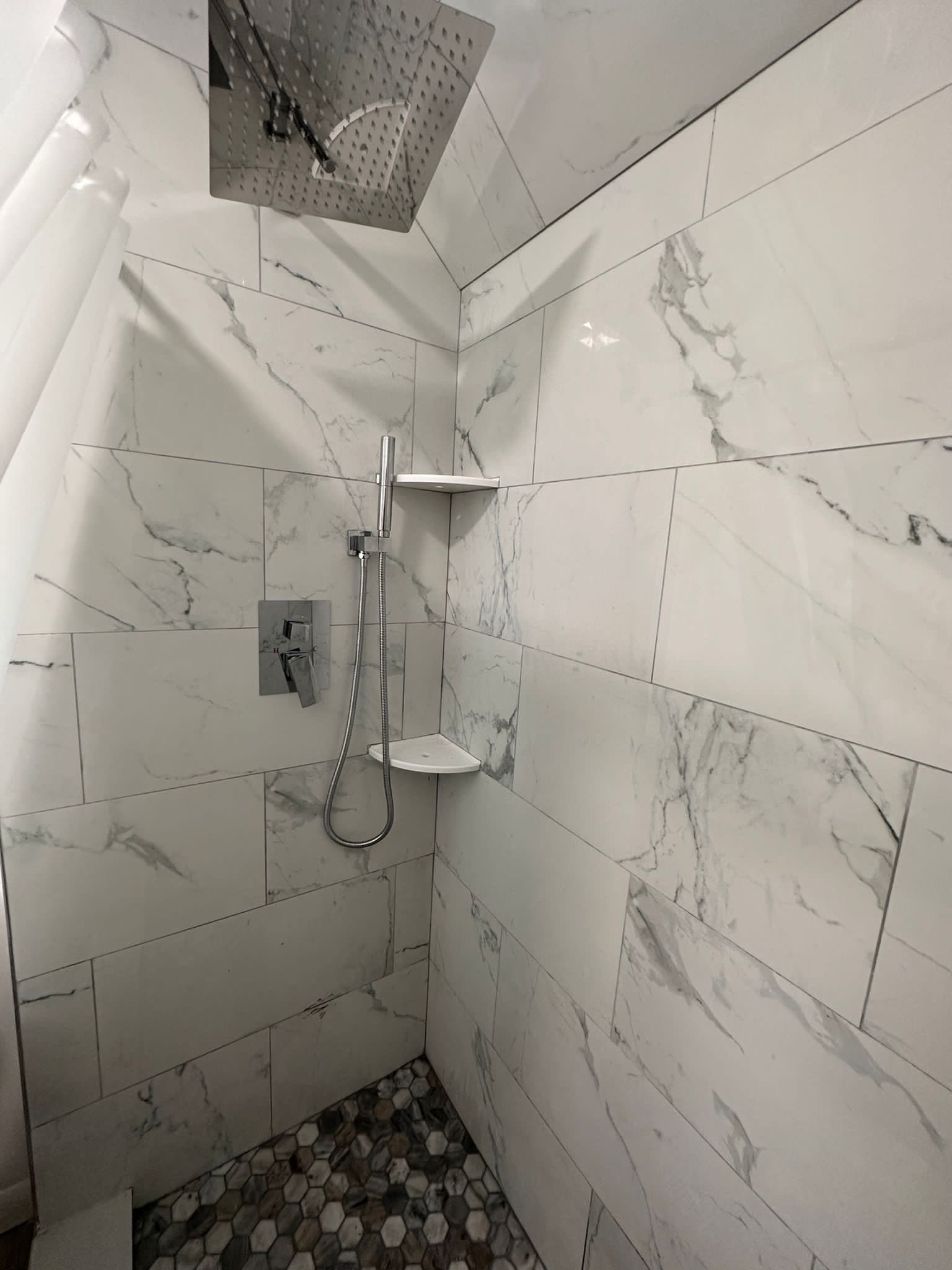 Bathroom Remodel using Tile by Home Concepts Construction