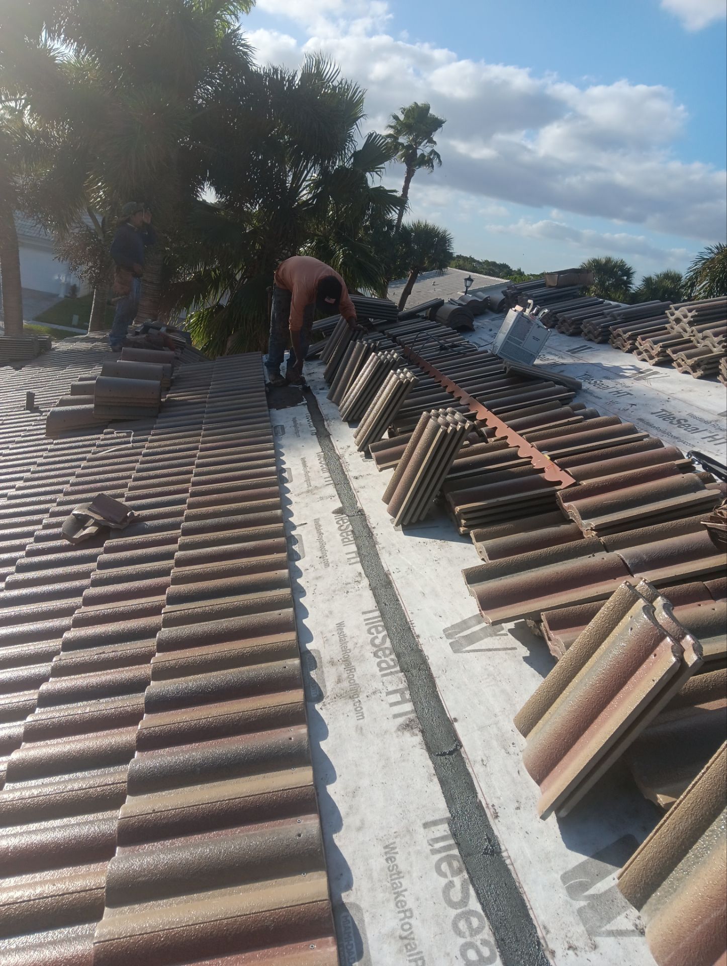 Concrete Tile Roof Replacement and Wood Decking Repair in Boca Raton by Aastro Roofing