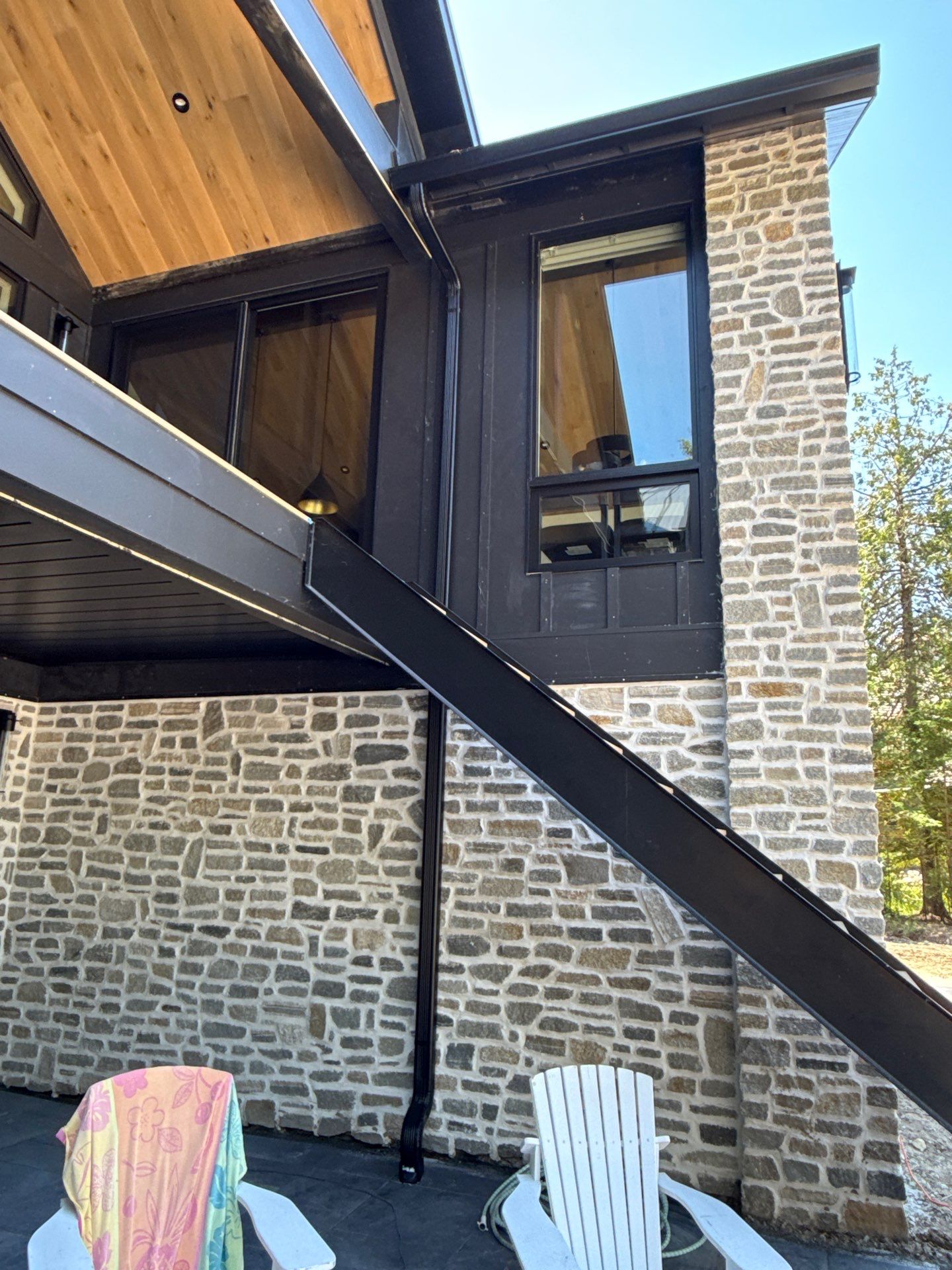 Gutter and Drainage System Installation for Modern Residential Build by Rainbow Seamless Systems