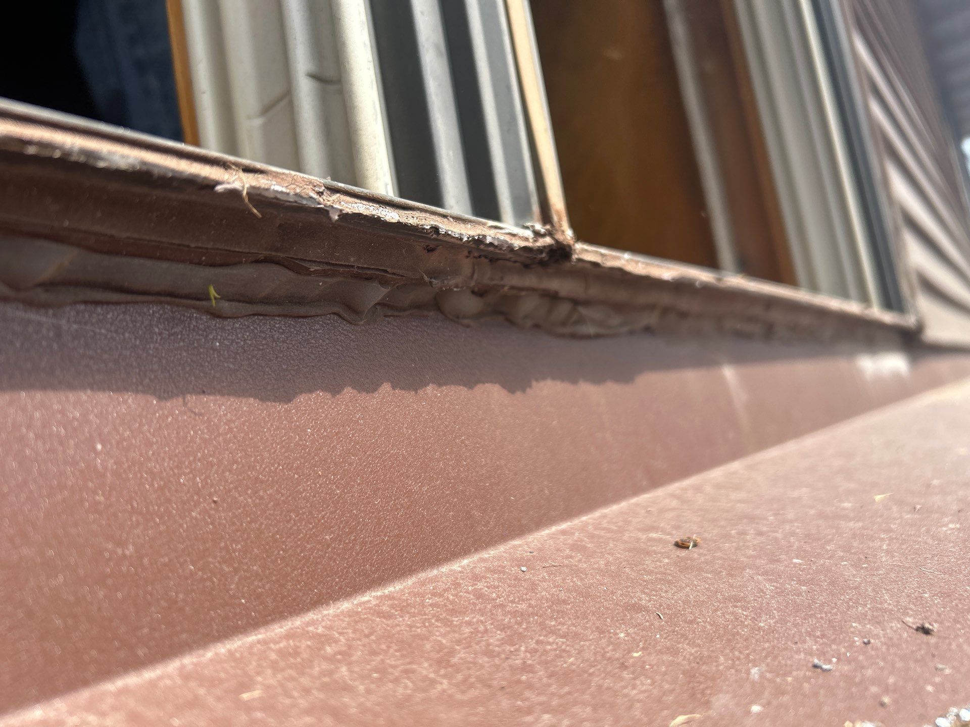 Pella Window installation using Pella Lifestyle wood/Aluminum window by United Windows and Siding LLC