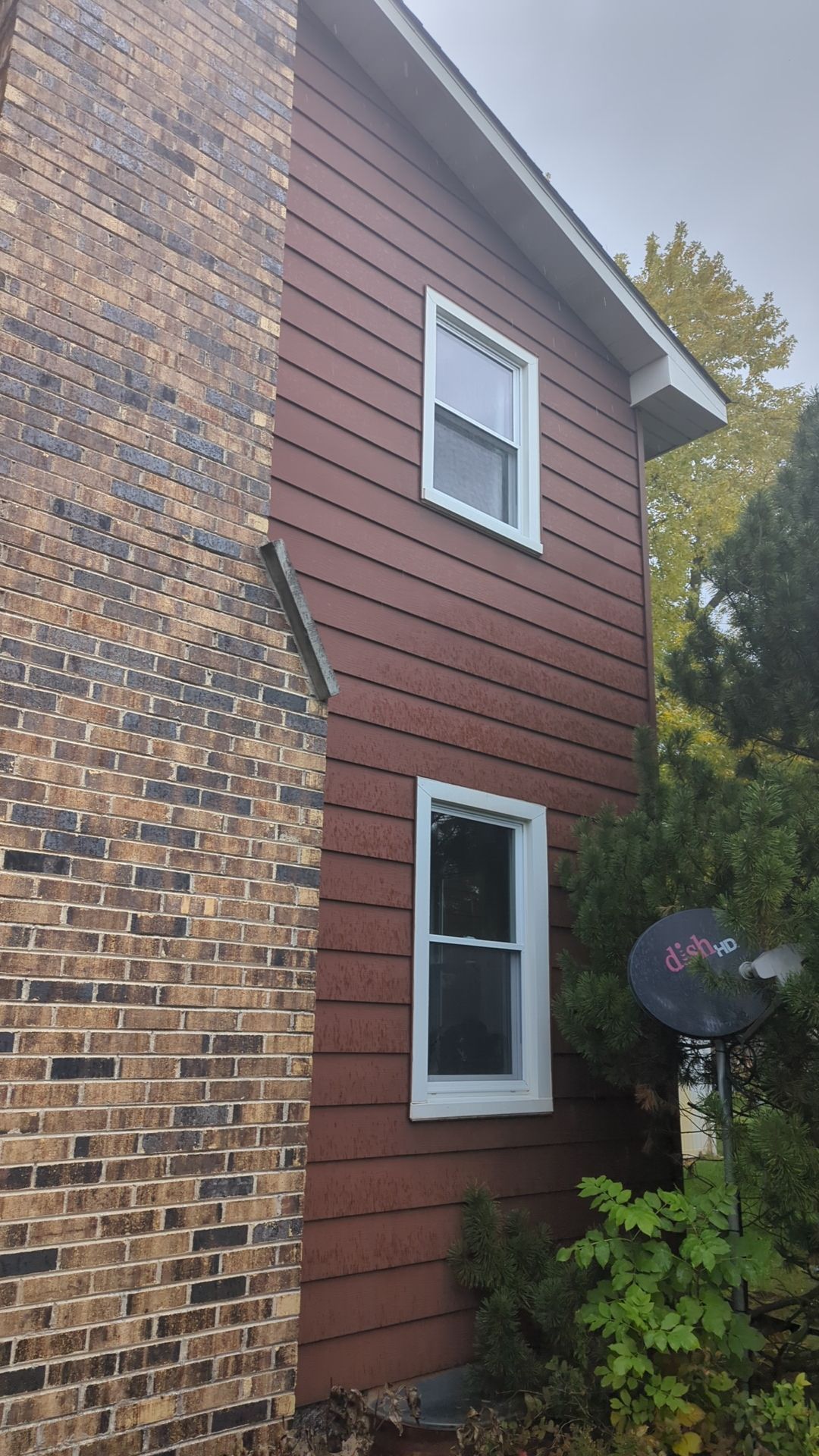Vinyl siding replacement using CertainTeed Monogram double 5" vinyl siding  by AJ Exteriors & Roofing Inc.