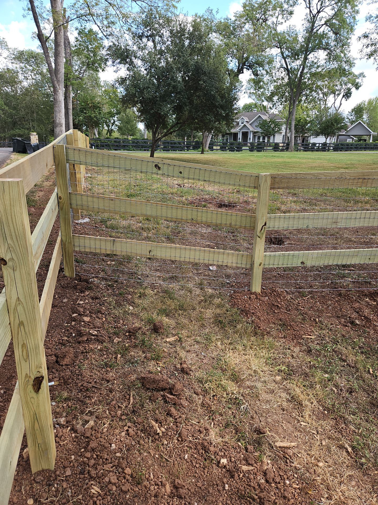 Ranch Style fence Plus Iron installation by Tim's Fences