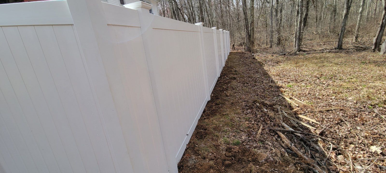 Vinyl Privacy Fence, White  by DiGiorgi Roofing and Siding Inc