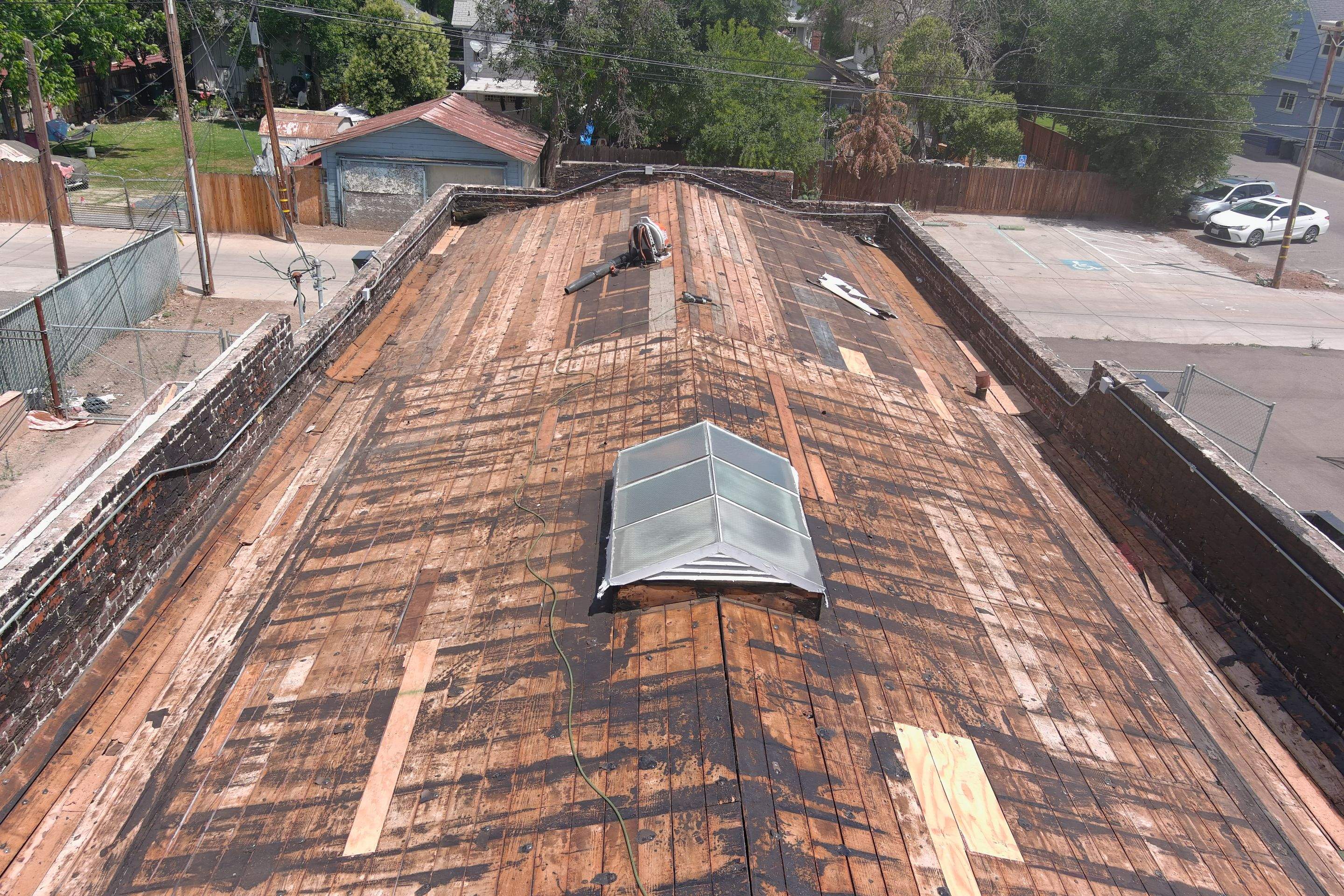 Commercial Roofing Installation using Conklin BenchPly system with PUMA top coat (imbedded fabric system) by Straight Edge Roofing Inc