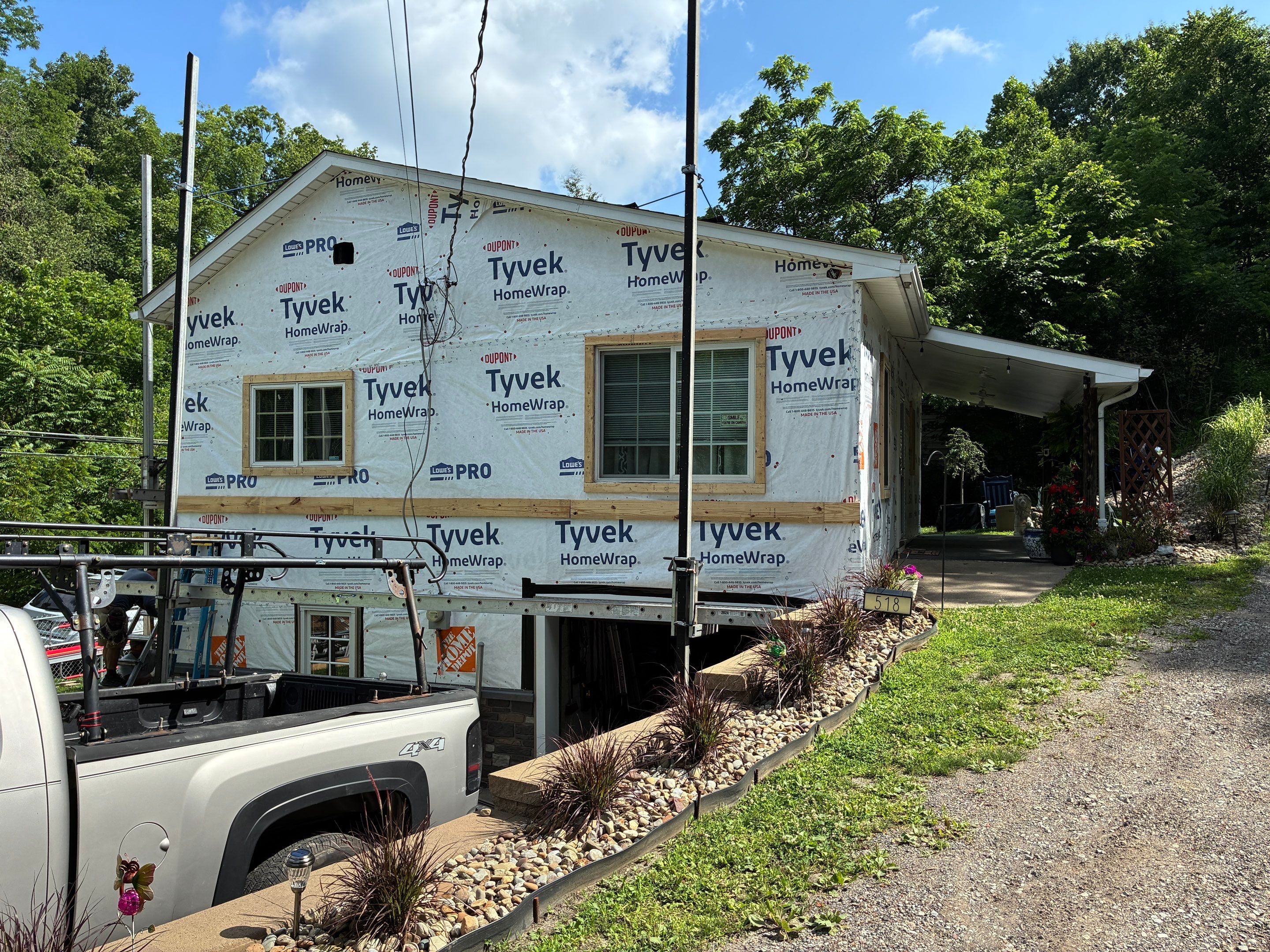 Jefferson Hills Vertical Board and Batten Siding and TandoStone Renovation by Ideal Siding Pittsburgh