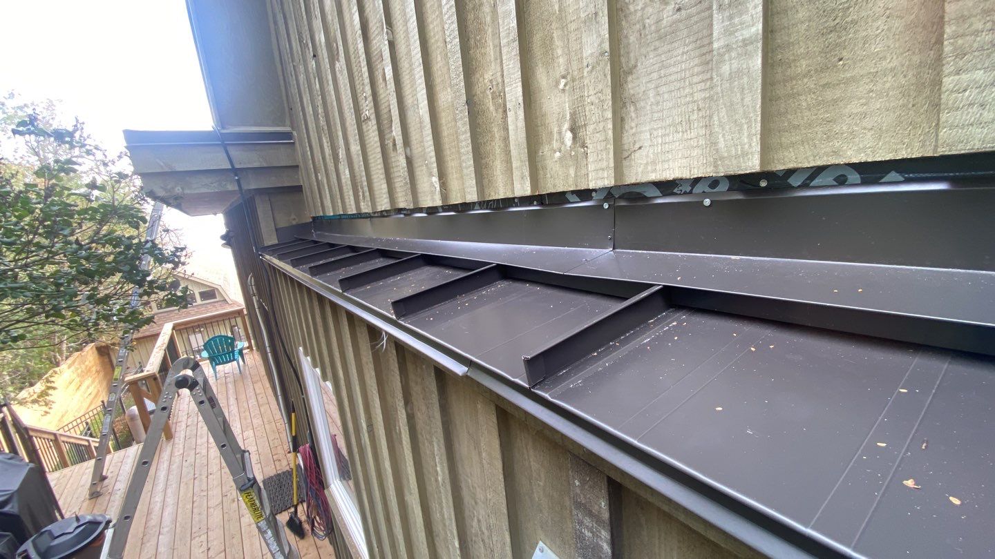 Residential Roofing Installation using 16" Standing Seam Panels by Jay Carter Roofing & Sheet Metal