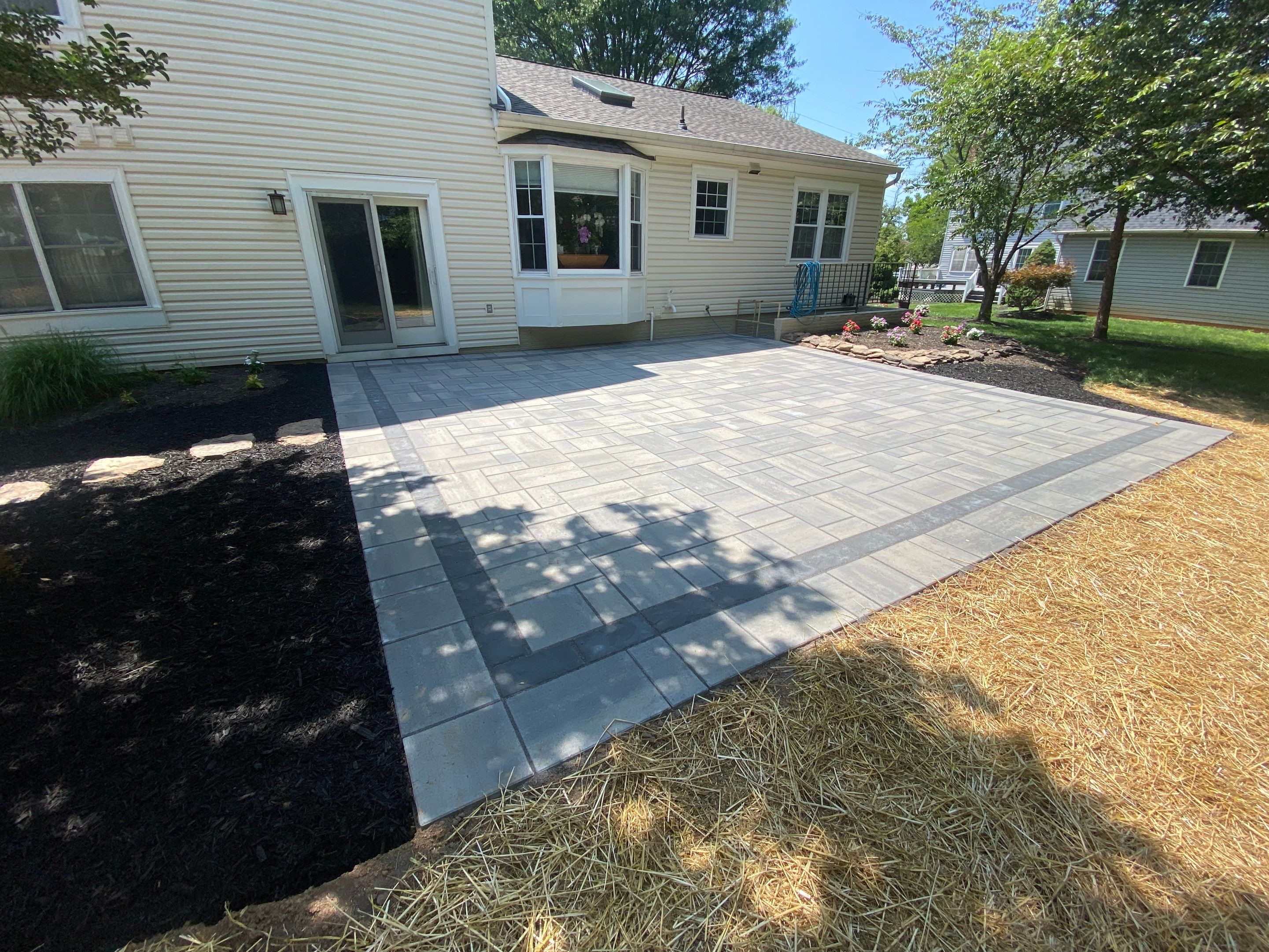 Backyard Transformation using Techo-Bloc Pavers by The Smet Companies, LLC