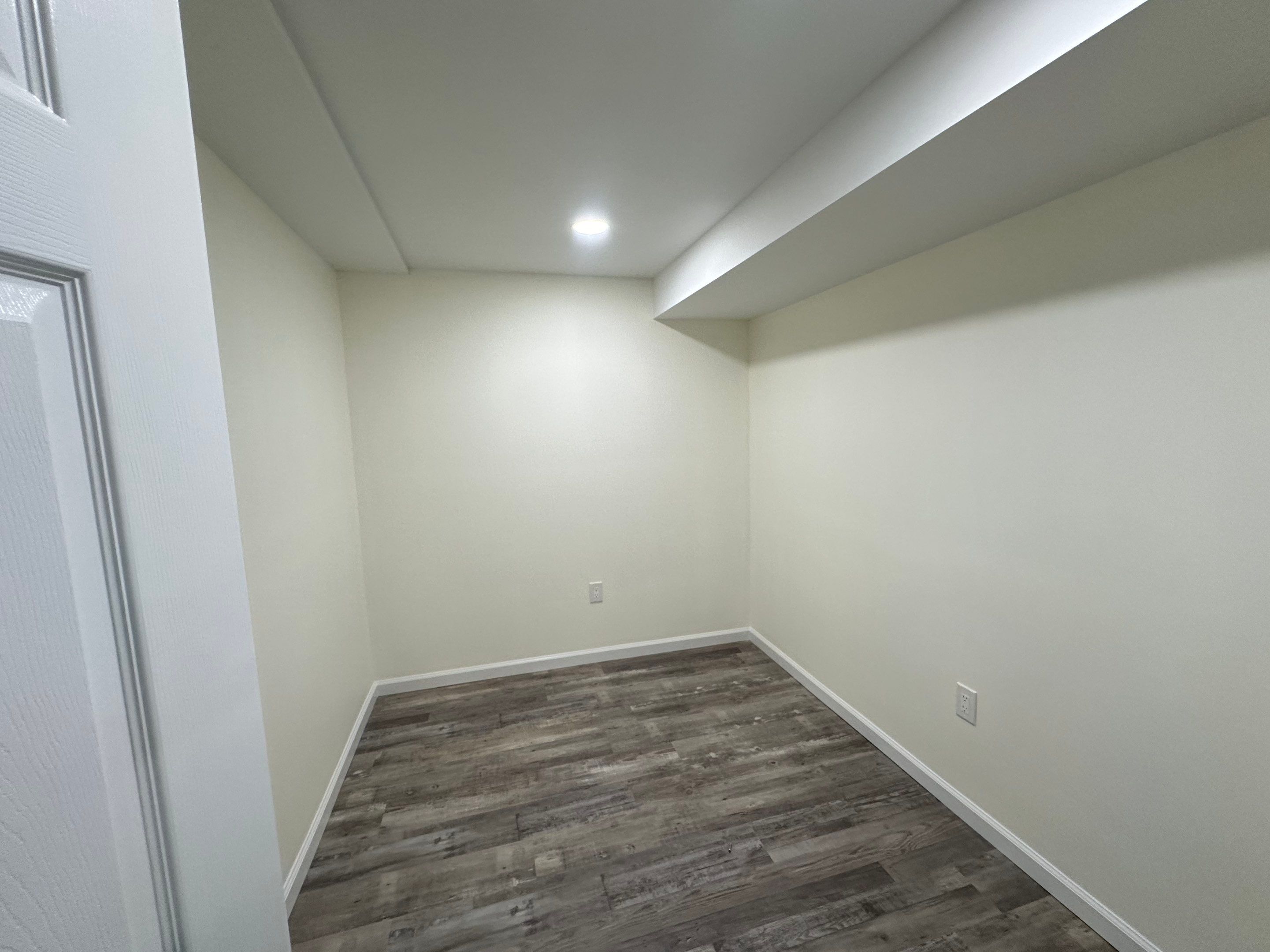 Basement Remodel using Wood by Home Concepts Construction