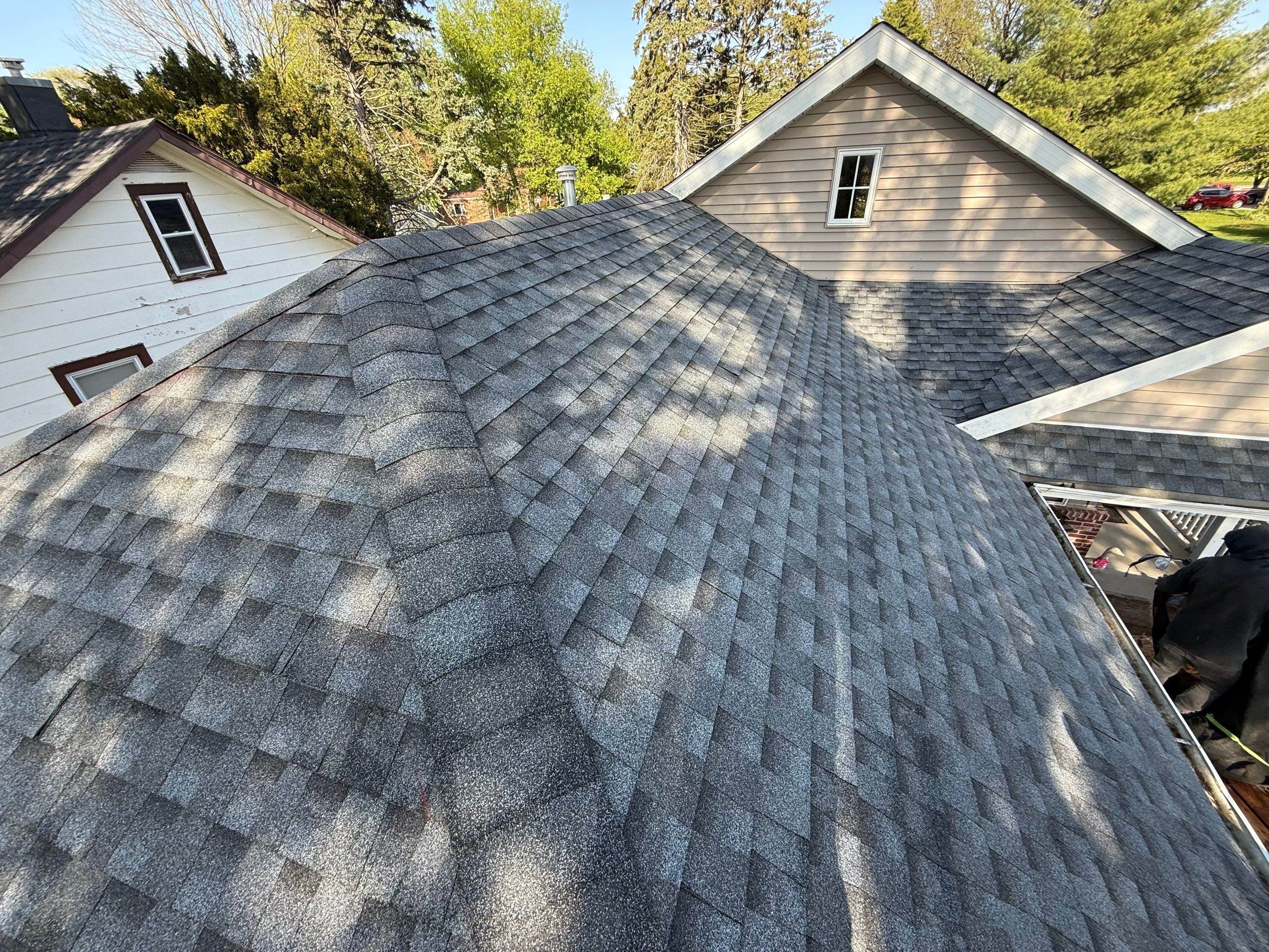 Roof replacement by Optimal Home Improvement 