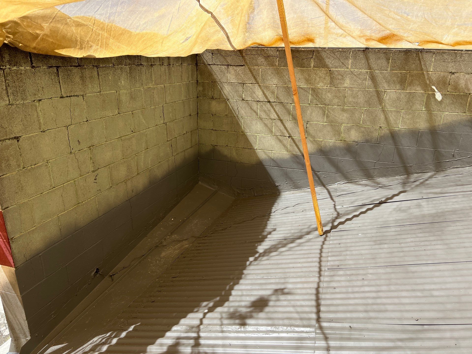 Spray foam and coatings using Conklin Benchmark/ PUMA XL acrylic coatings over metal and foam by Straight Edge Roofing Inc