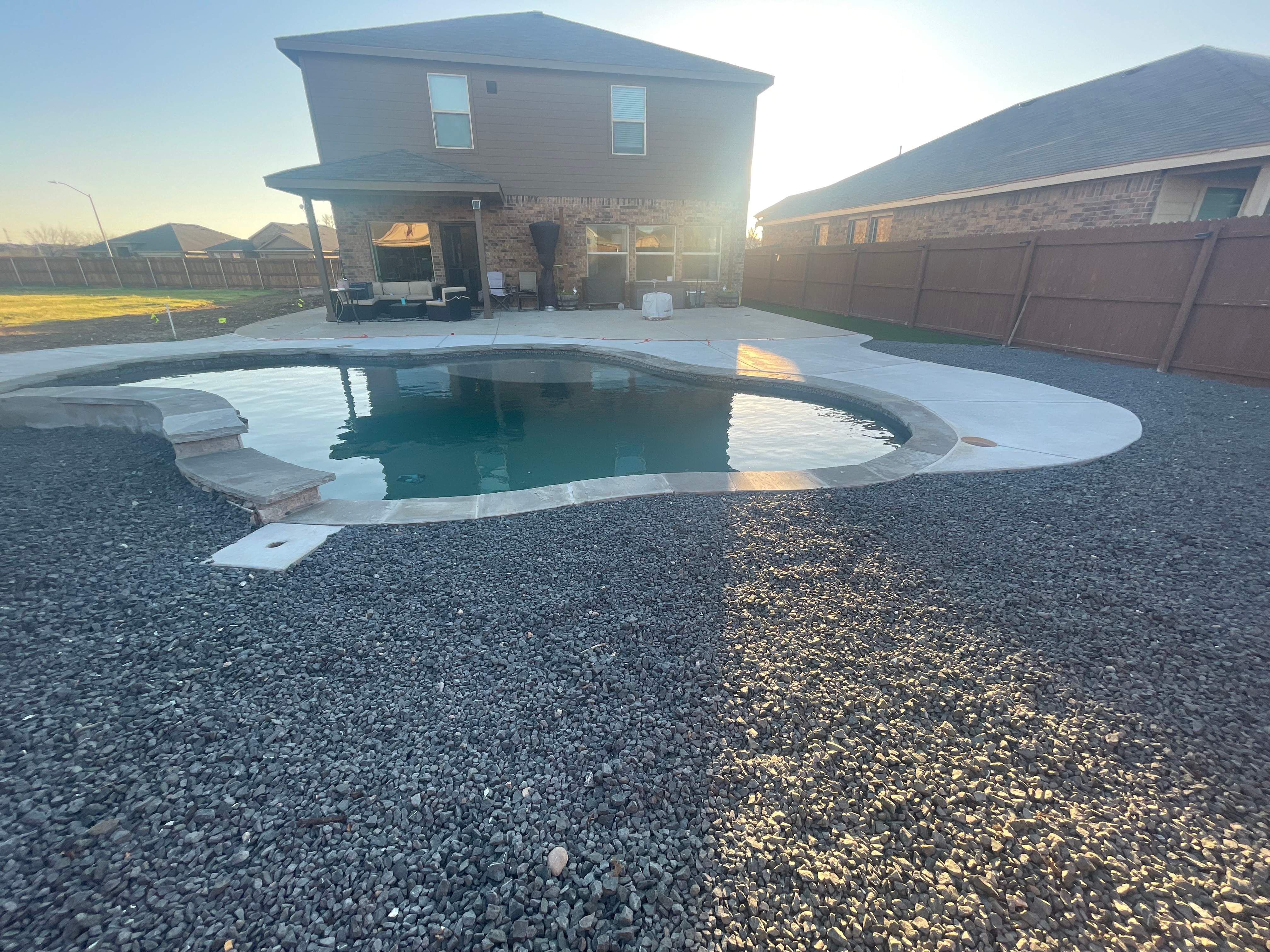 Freeform Pool with Sun Shelf by Pinnacle Pools and Spas - DFW