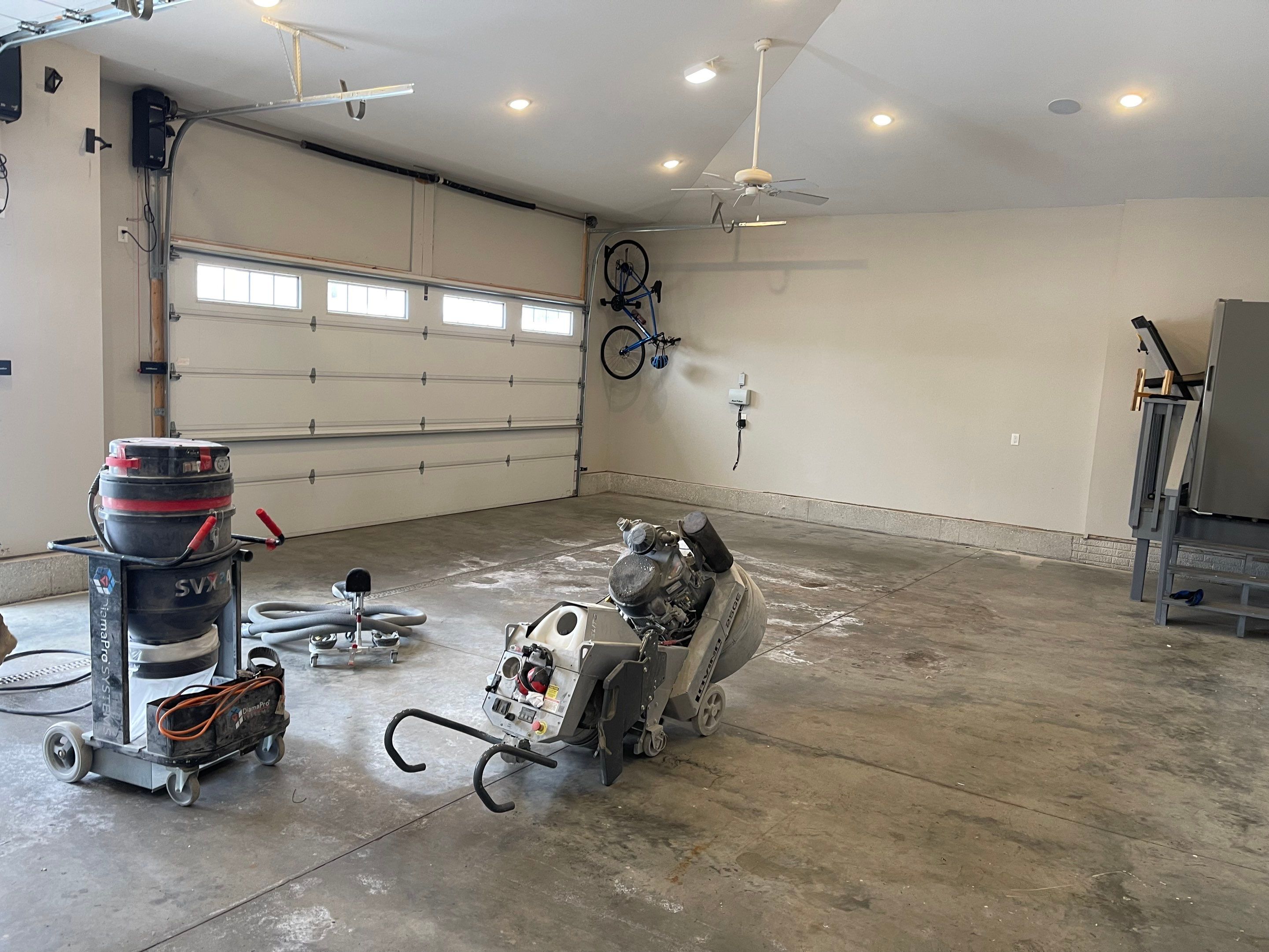 Garage using Domino  by Select Painting, Coatings & Garage Cabinets