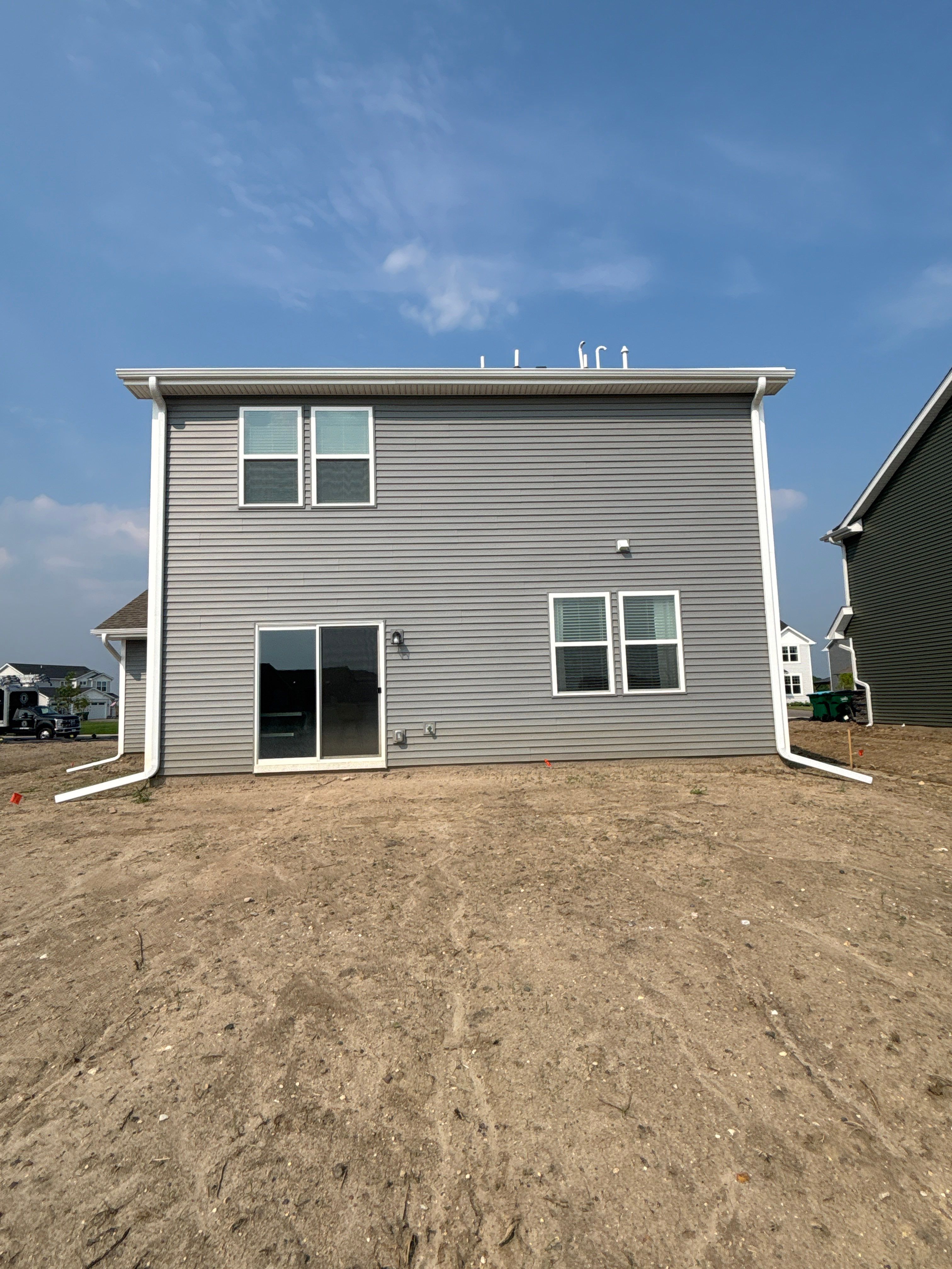 5-Inch White Seamless Gutter Installation – Otsego, MN by Next Level Seamless Gutters / Exteriors Inc.