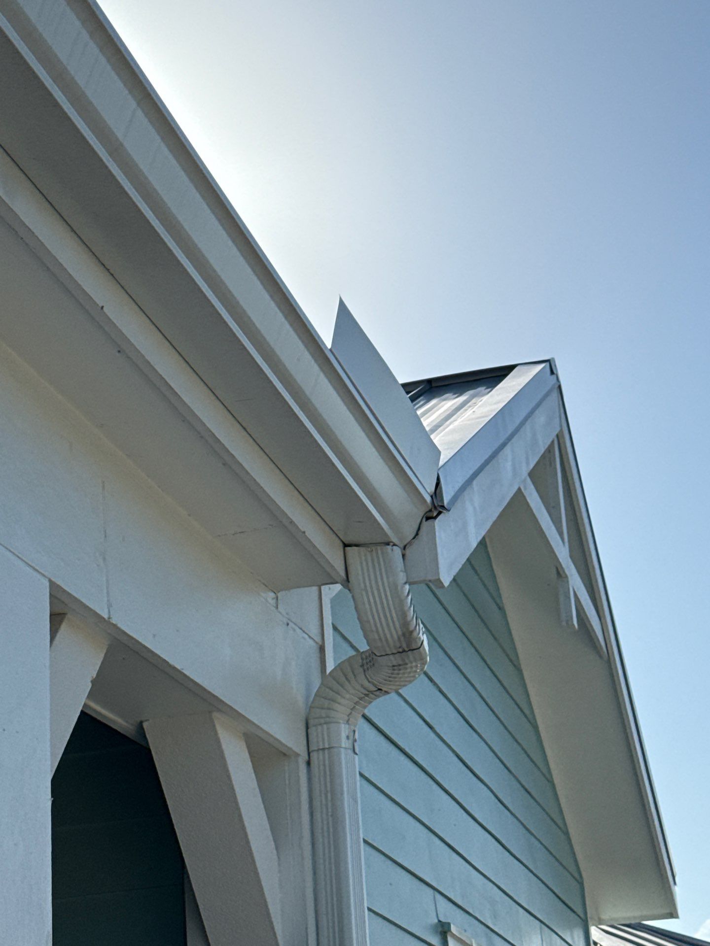 New White Seamless Gutters Installation and Downspouts, Reseal Gutters in Fort Myers Beach, FL  by Gutter Professors