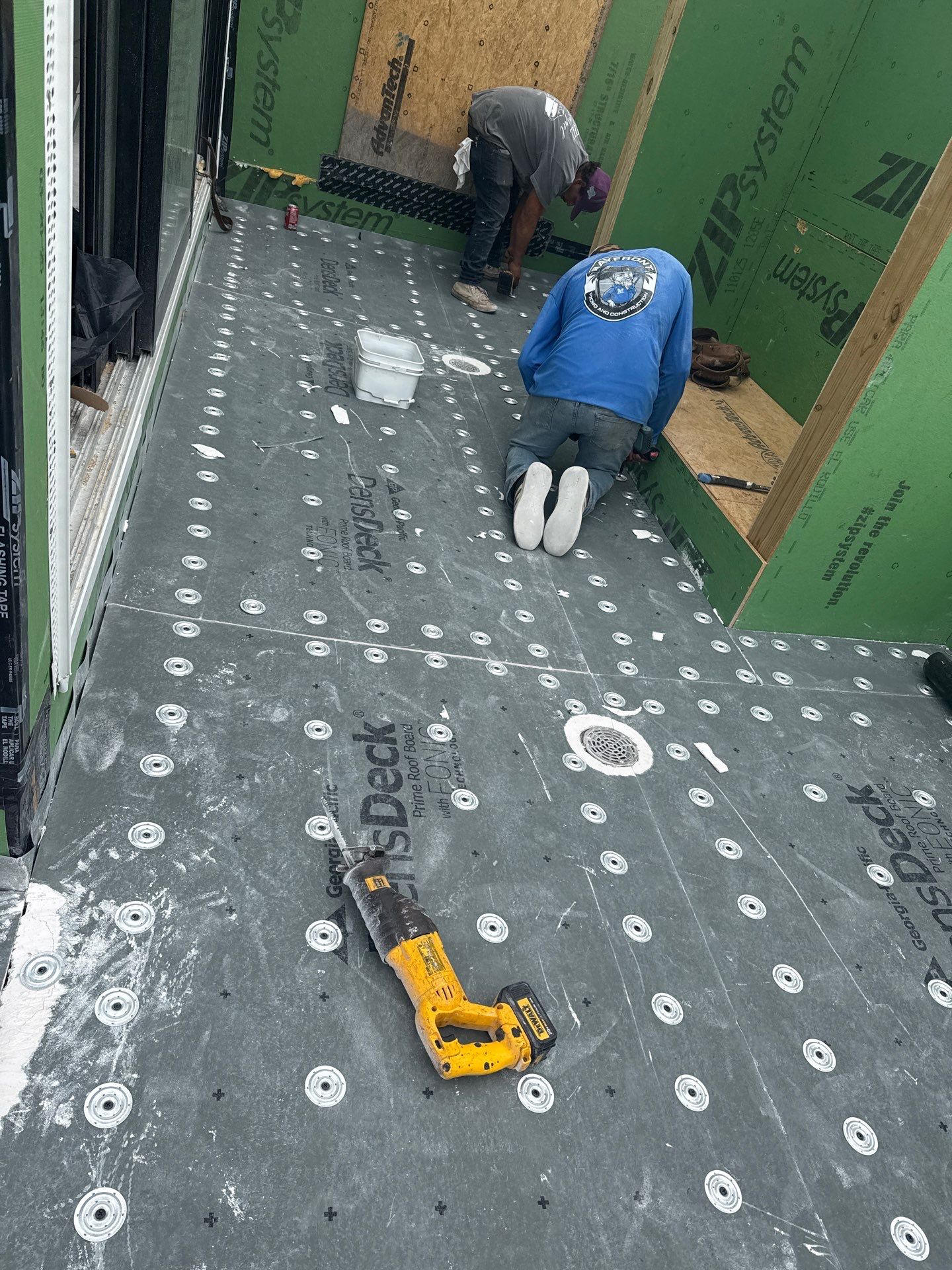 Walk Out, Island Style by Bayfront Roofing and Construction