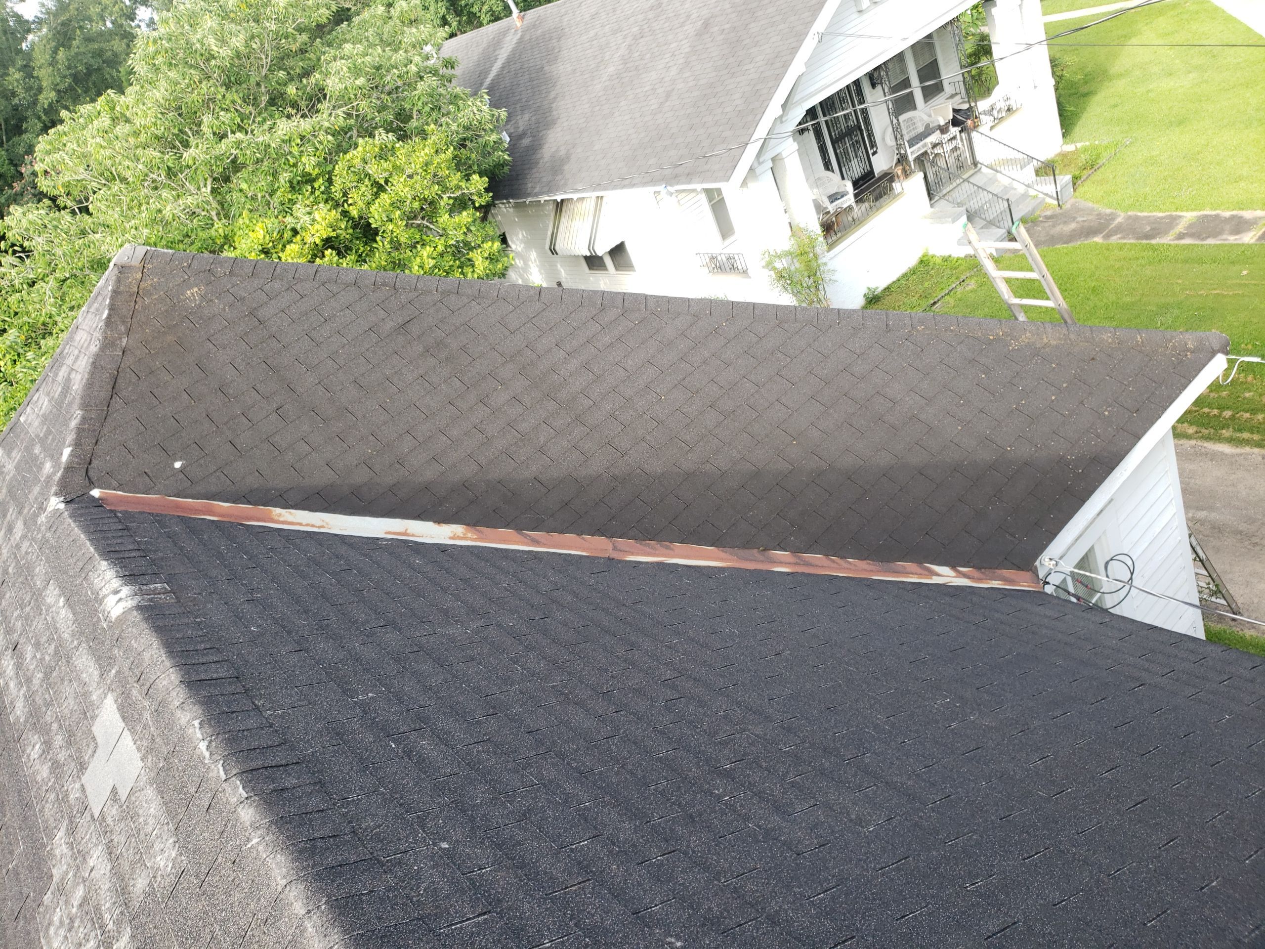 Residential Roofing Installation using Roof Replacement by American Roofing & Construction LLC
