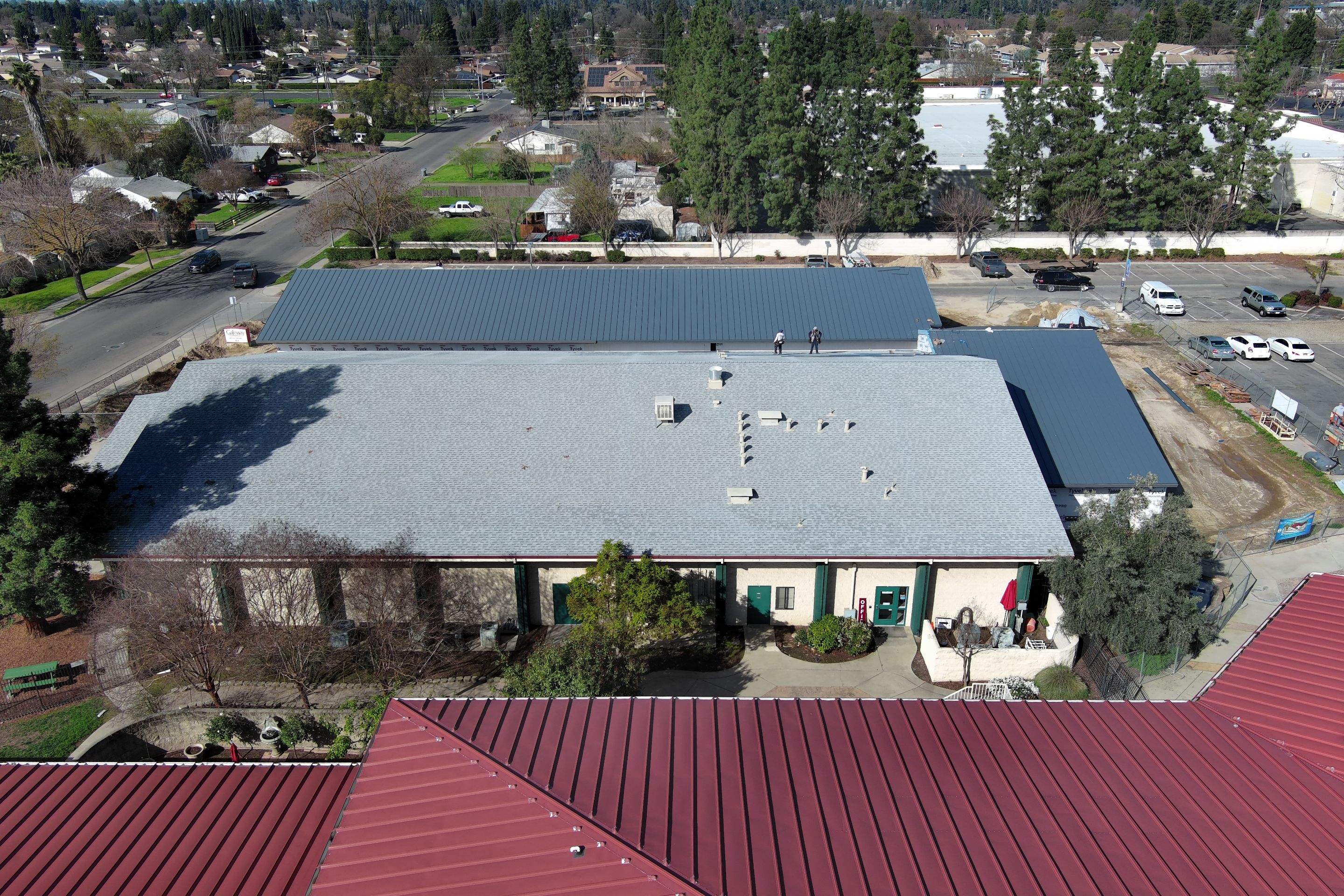 Metal roofing installation on church by Straight Edge Roofing Inc