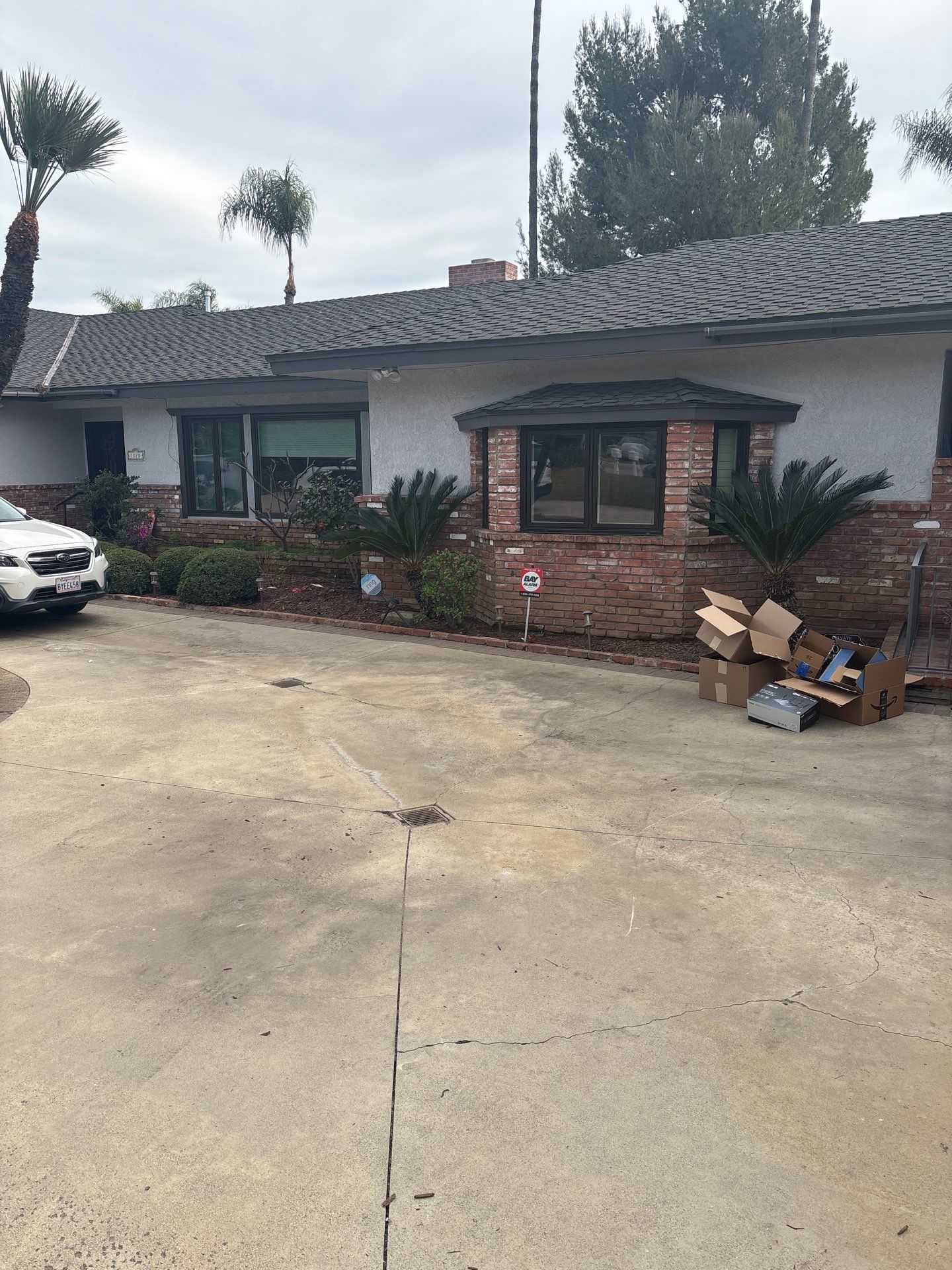 New Dark Frame Milgard Window and Sliding Door Installation in Covina by American Window Company