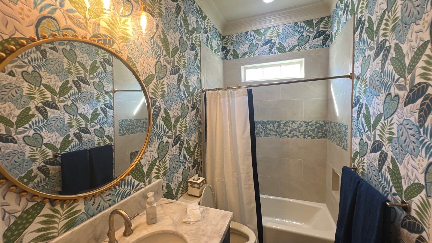 Wallpaper Installation in the Bathroom by Nomad Painting