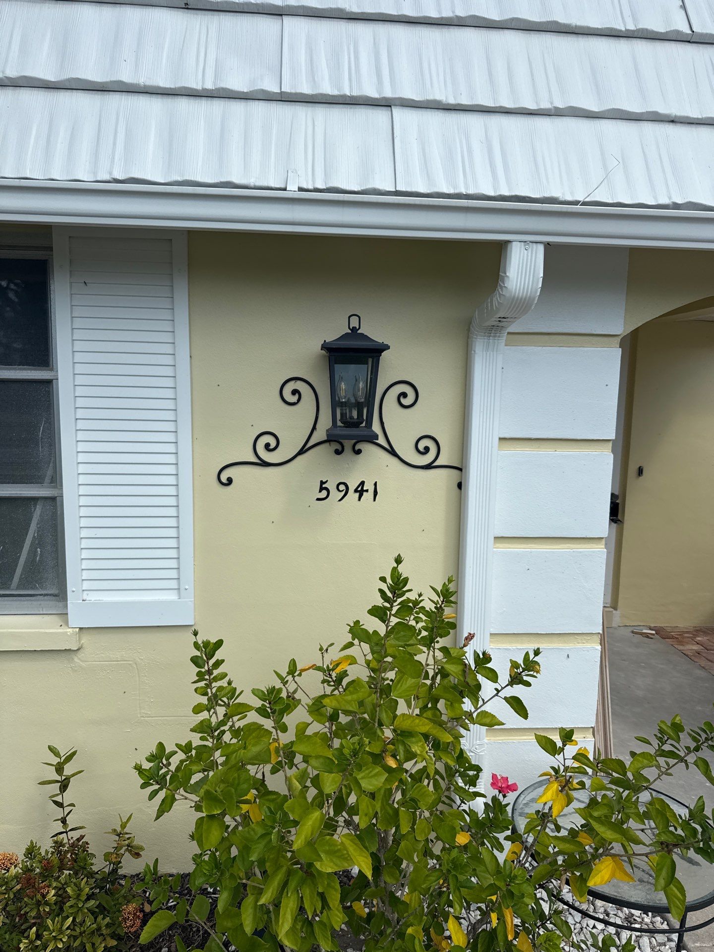 White Gutters and Matching Downspouts in Sarasota FL by Gutter Professors