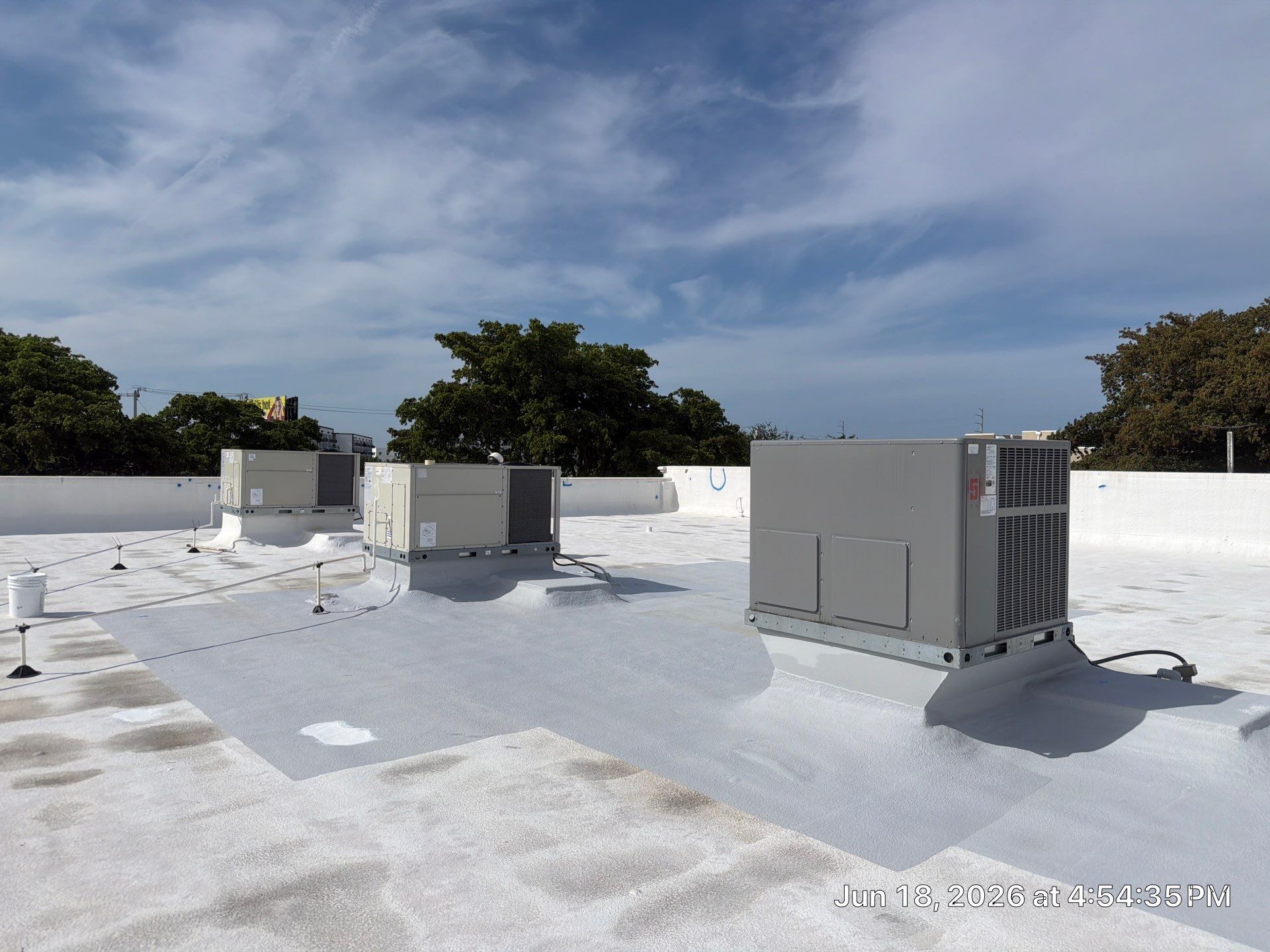 Commercial Flat Roof Restoration and Elastomeric Waterproofing in Delray Beach by Roof King LLC