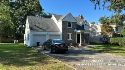 White Seamless Gutter and Downspout Replacement in West Hempstead