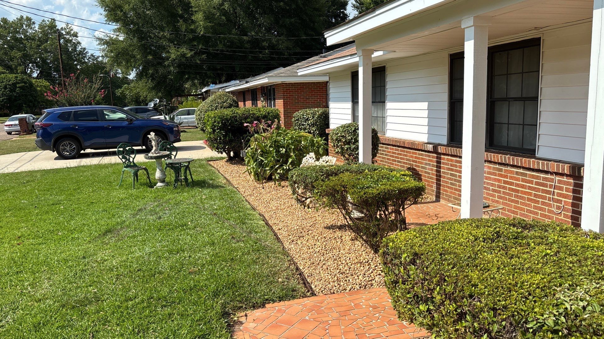 Front Yard Landscape Cleanup and Gravel Bed Installation in Montgomery by BTops Landscaping Inc.