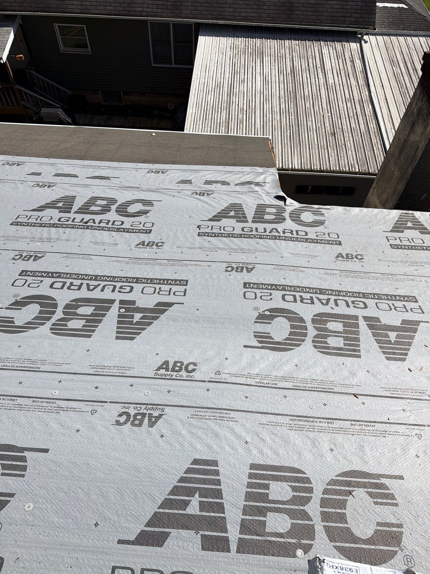 Residential Roofing Installation using GAF Timberline HDZ Charcoal by Rainstoppers Roofing