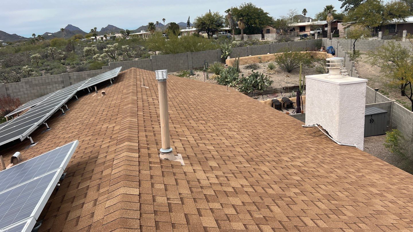 Charcoal Shingles by Reimagine Roofing