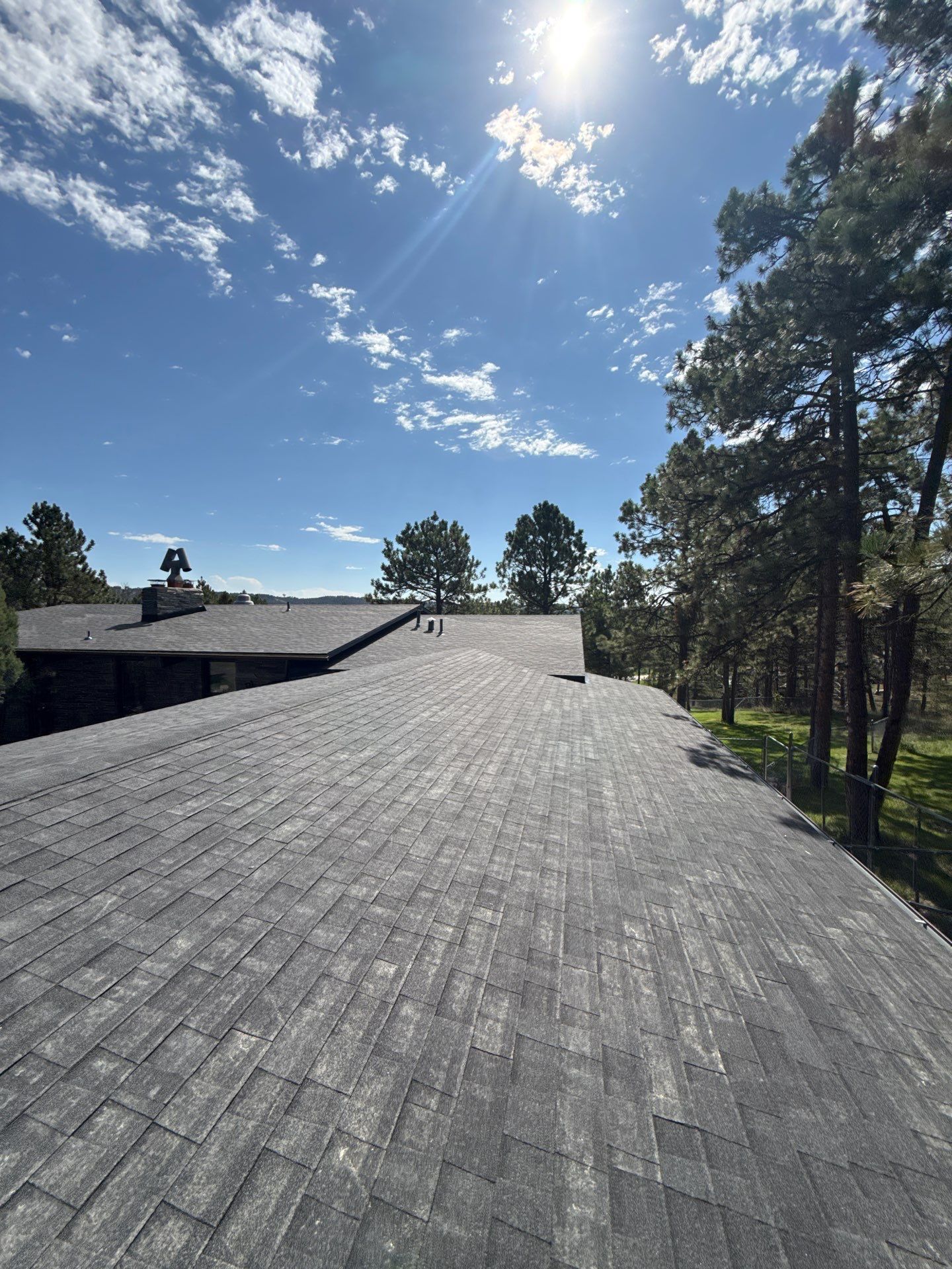 Full Architectural Shingle Installation for Contemporary Rapid City Residence by Weather-Tite Exteriors LLC