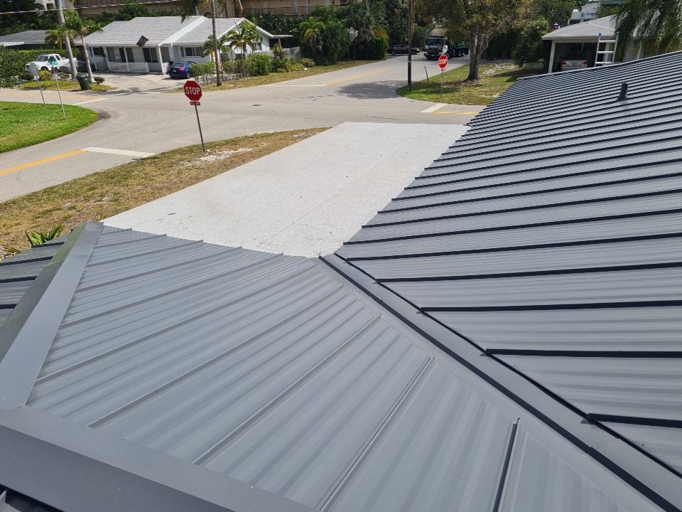 Residential Roofing Installation using 1" Nail strip metal roof by BLUES BROTHERS CONSTRUCTION CORP