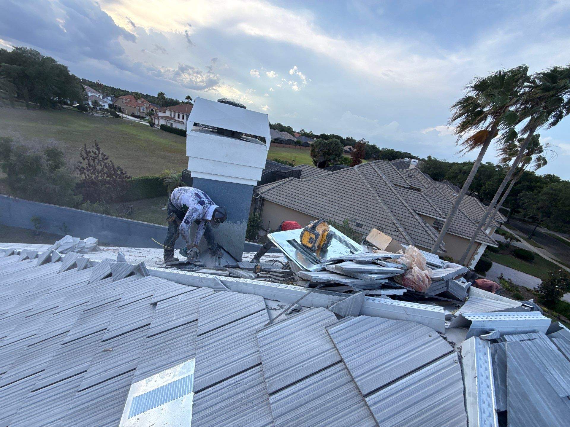 Winter Park Concrete Tile Roof Replacement and Chimney Flashing Installation by Fortified Roofing Solutions Corp.