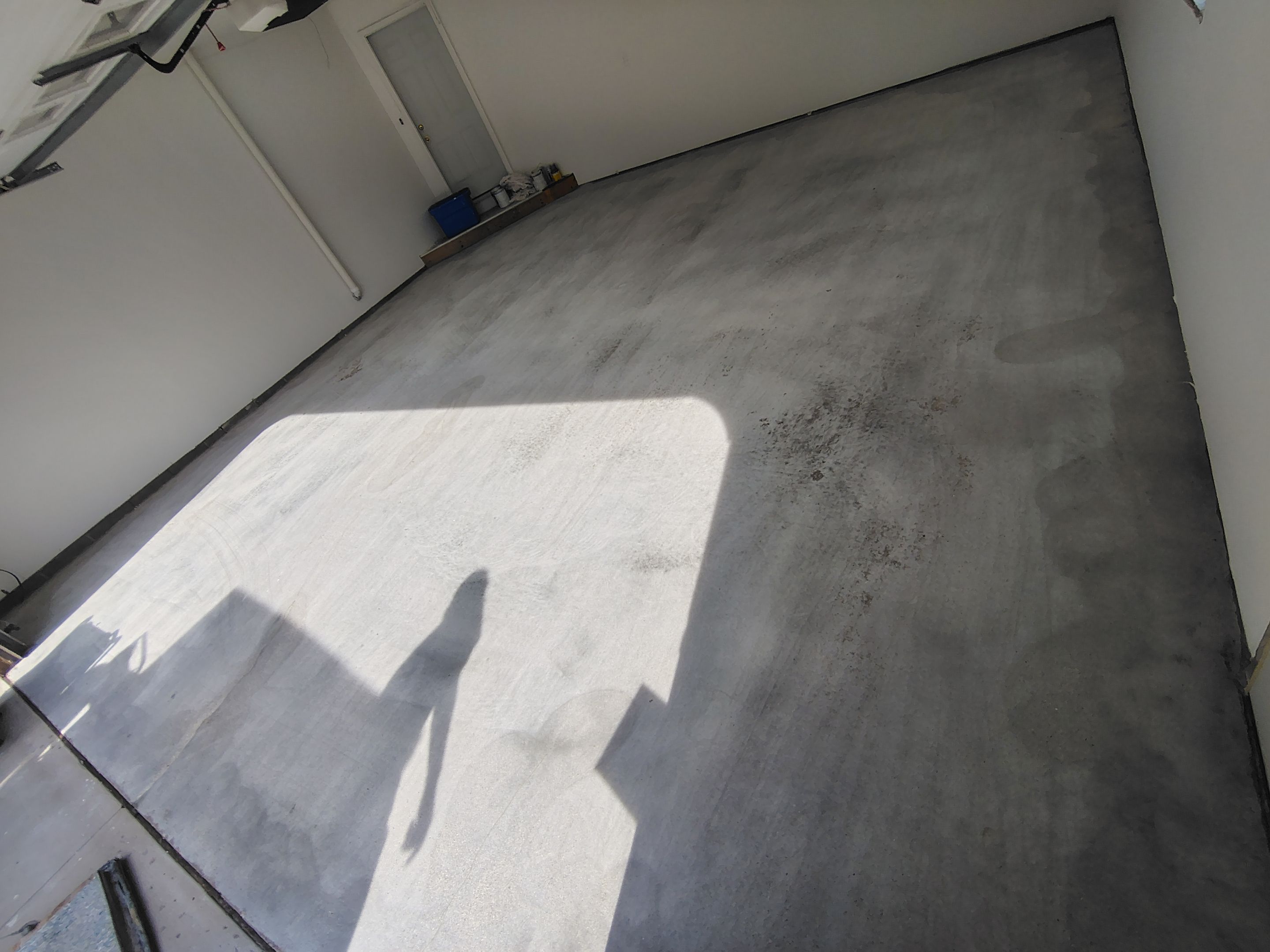 Sioux Falls Garage Floor Coating with Speckled Flake Finish by Select Painting, Coatings & Garage Cabinets