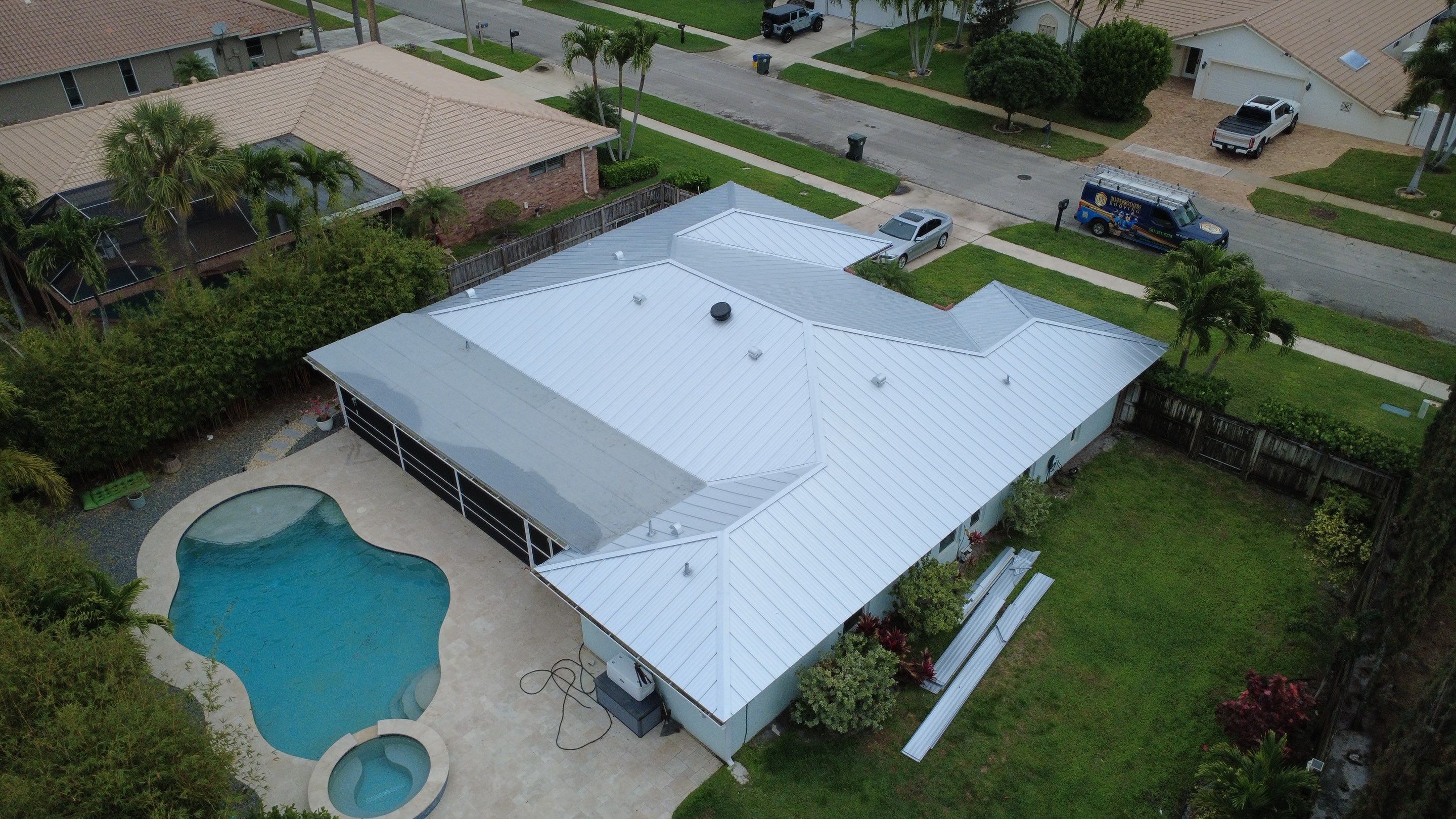 Residential Roofing Installation using 1" Nail strip metal roof by BLUES BROTHERS CONSTRUCTION CORP
