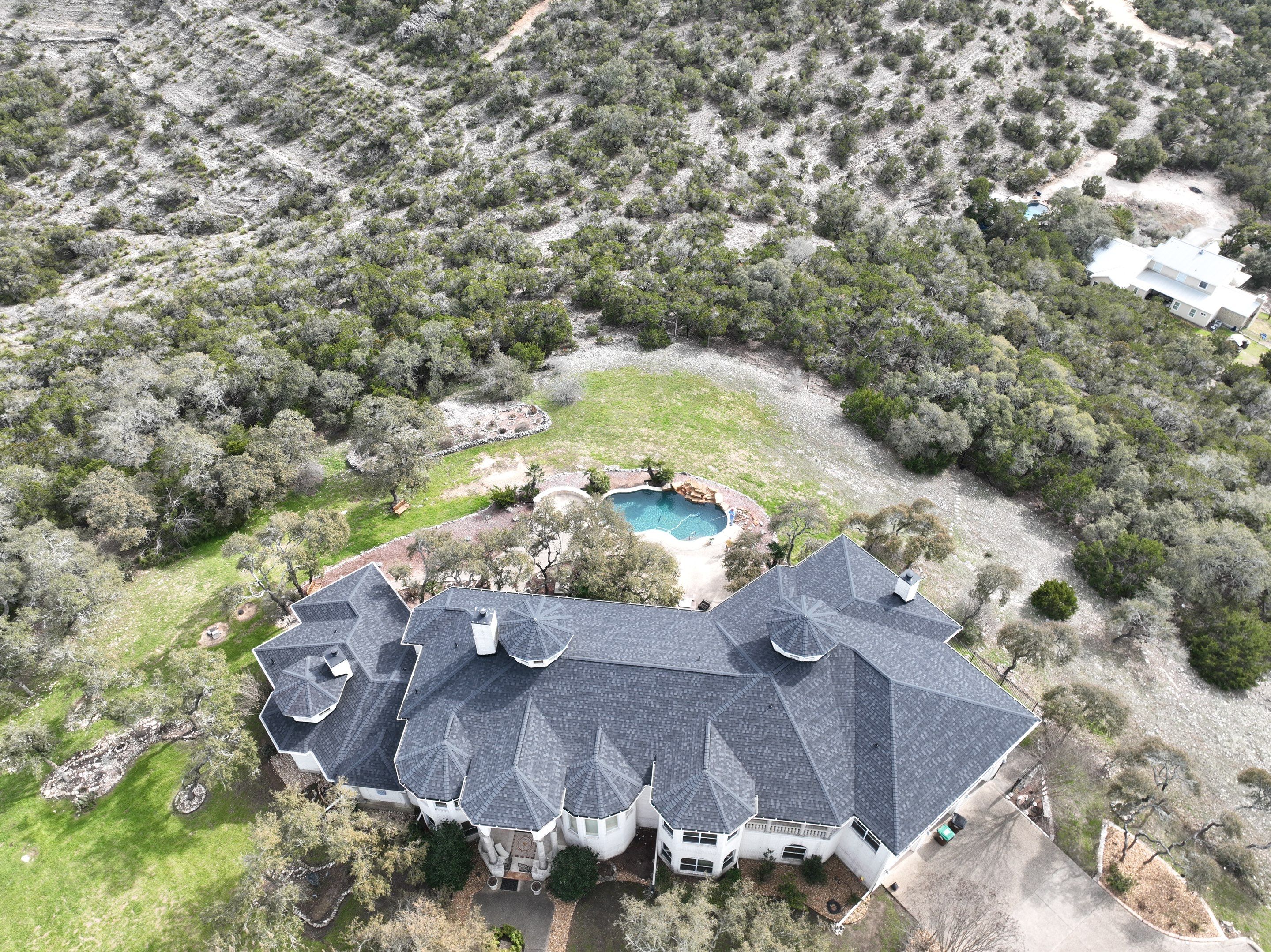 Residential Roof Replacement using 30 Year Laminate Shingles with High Profile Ridge by Premier Roofing and Contracting