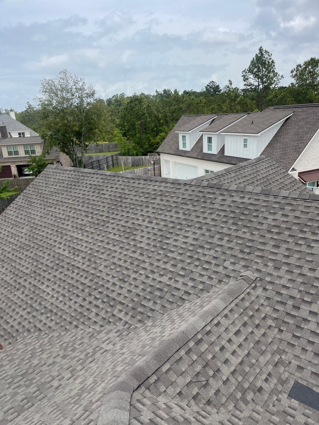 Residential Roofing Installation using Roof Replacement by American Roofing & Construction LLC