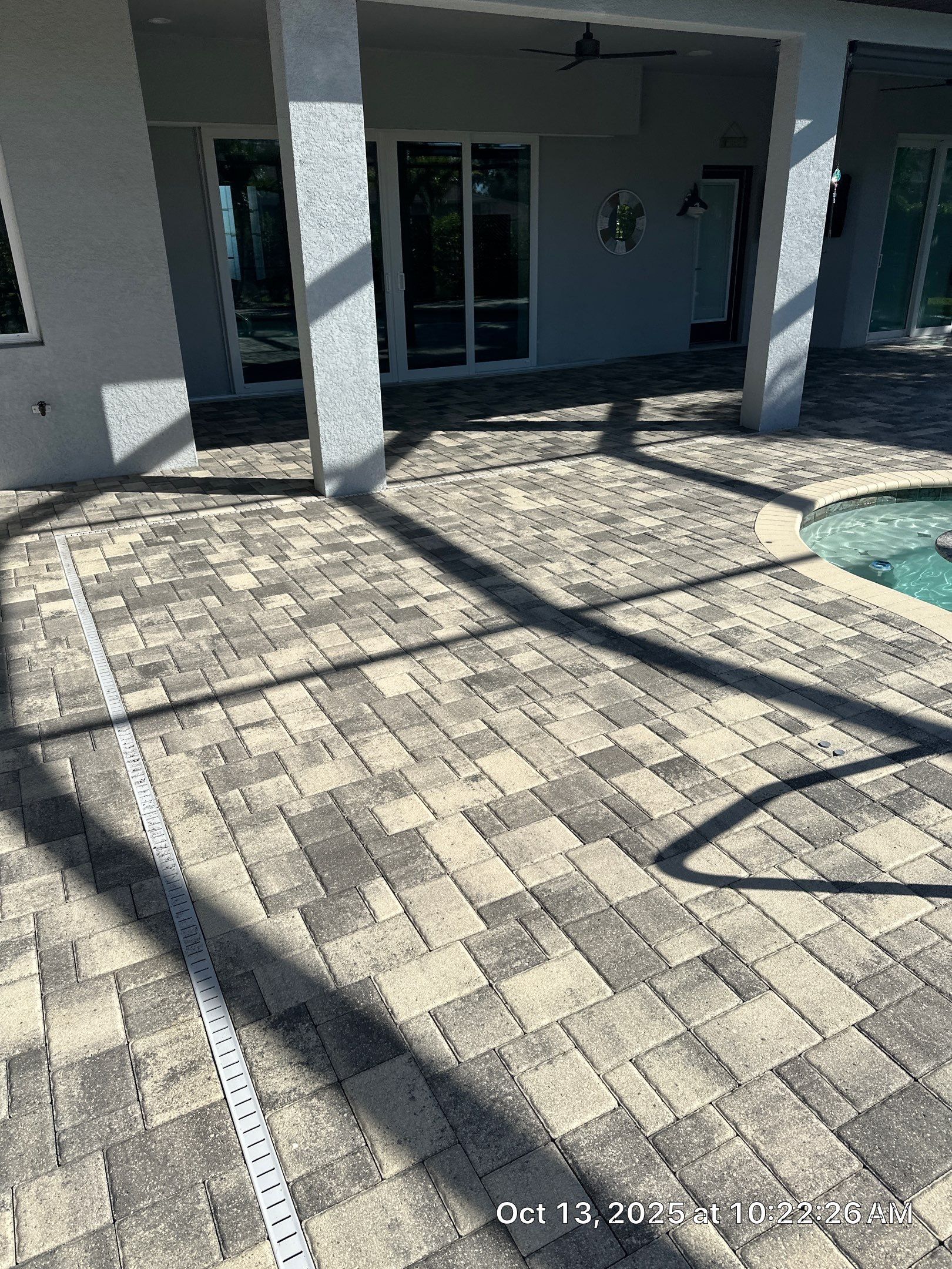 Residential Paver Sealing for Driveway and Pool Deck in La Paloma Sun City Center by Supreme Paver Experts