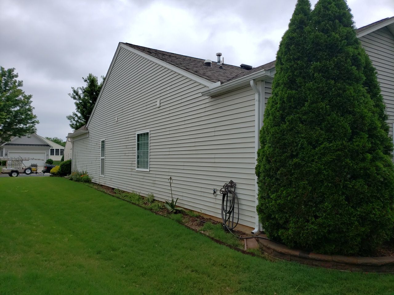 House Wash using cleaner by Power Wash Masters LLC