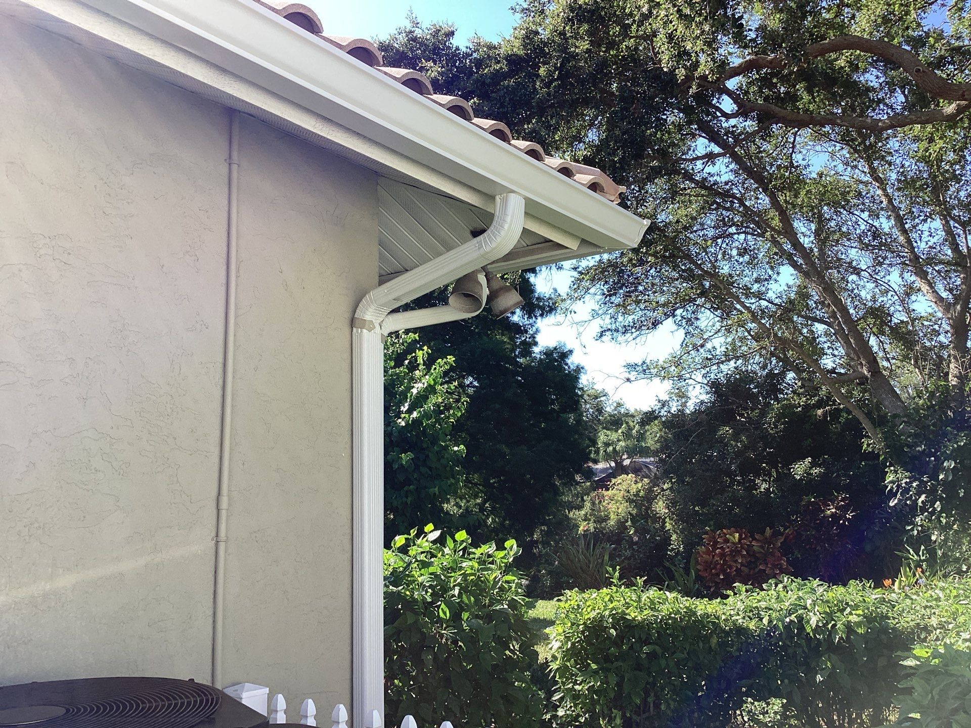 White Gutter Installation in Sarasota FL by Gutter Professors