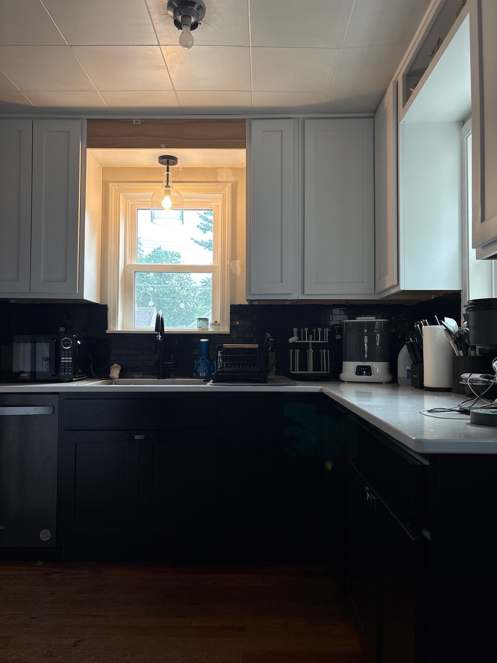 Modern Kitchen Renovation with Black and White Cabinetry in Lincoln by CompanyCam Sales Demo