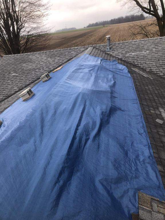 Storm damage roof replacement by Nitro Roofing and Construction