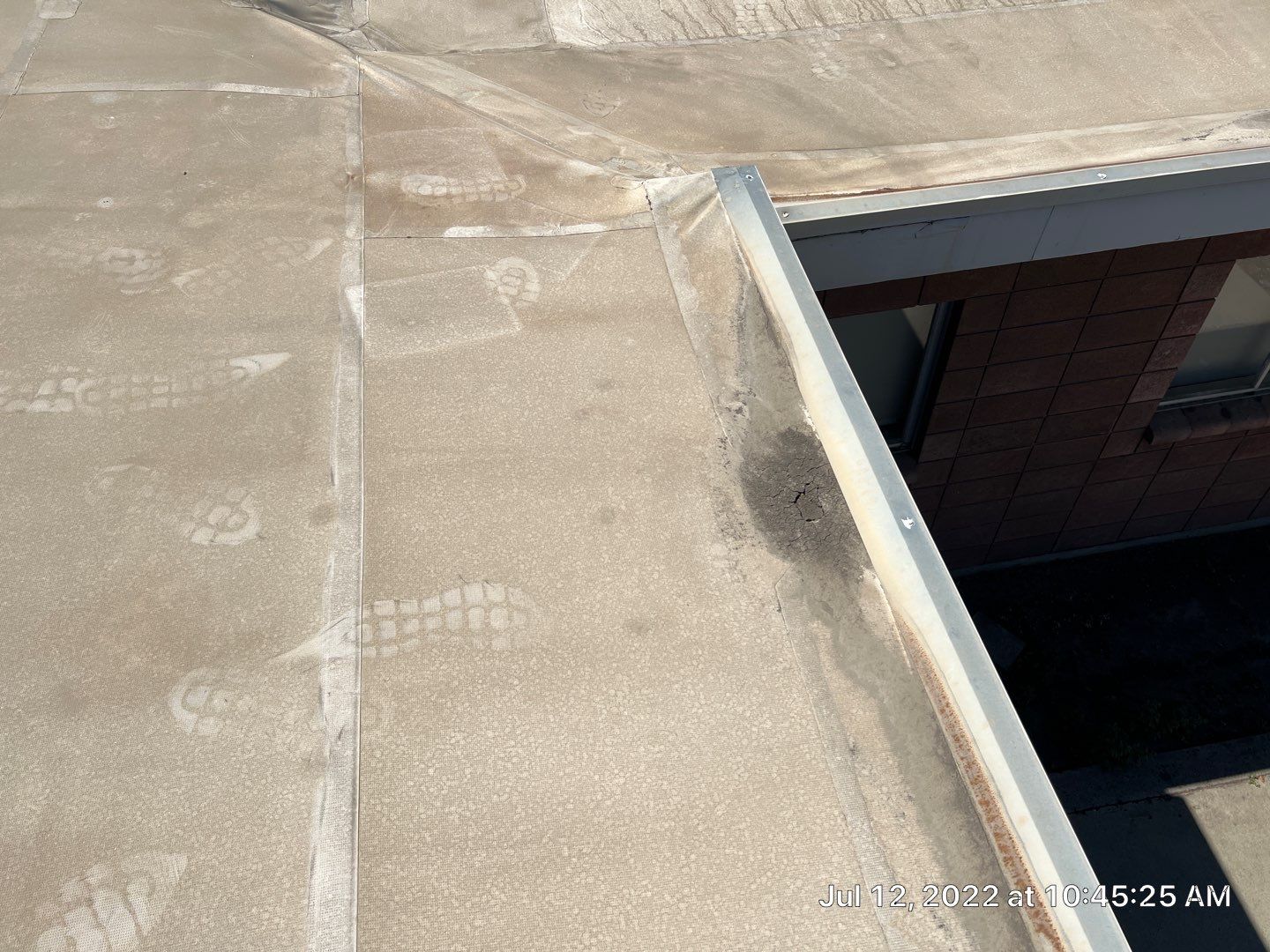 MR Roofing system using Benchmark/PUMA XL coatings over TPO single-ply roofing by Straight Edge Roofing Inc