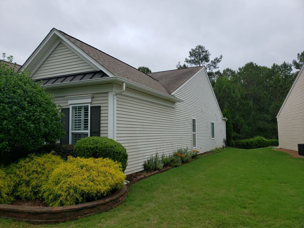 House Wash using cleaner by Power Wash Masters LLC