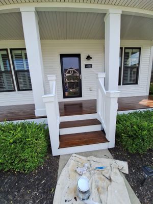 Freshly Stained Deck with Painted Railings