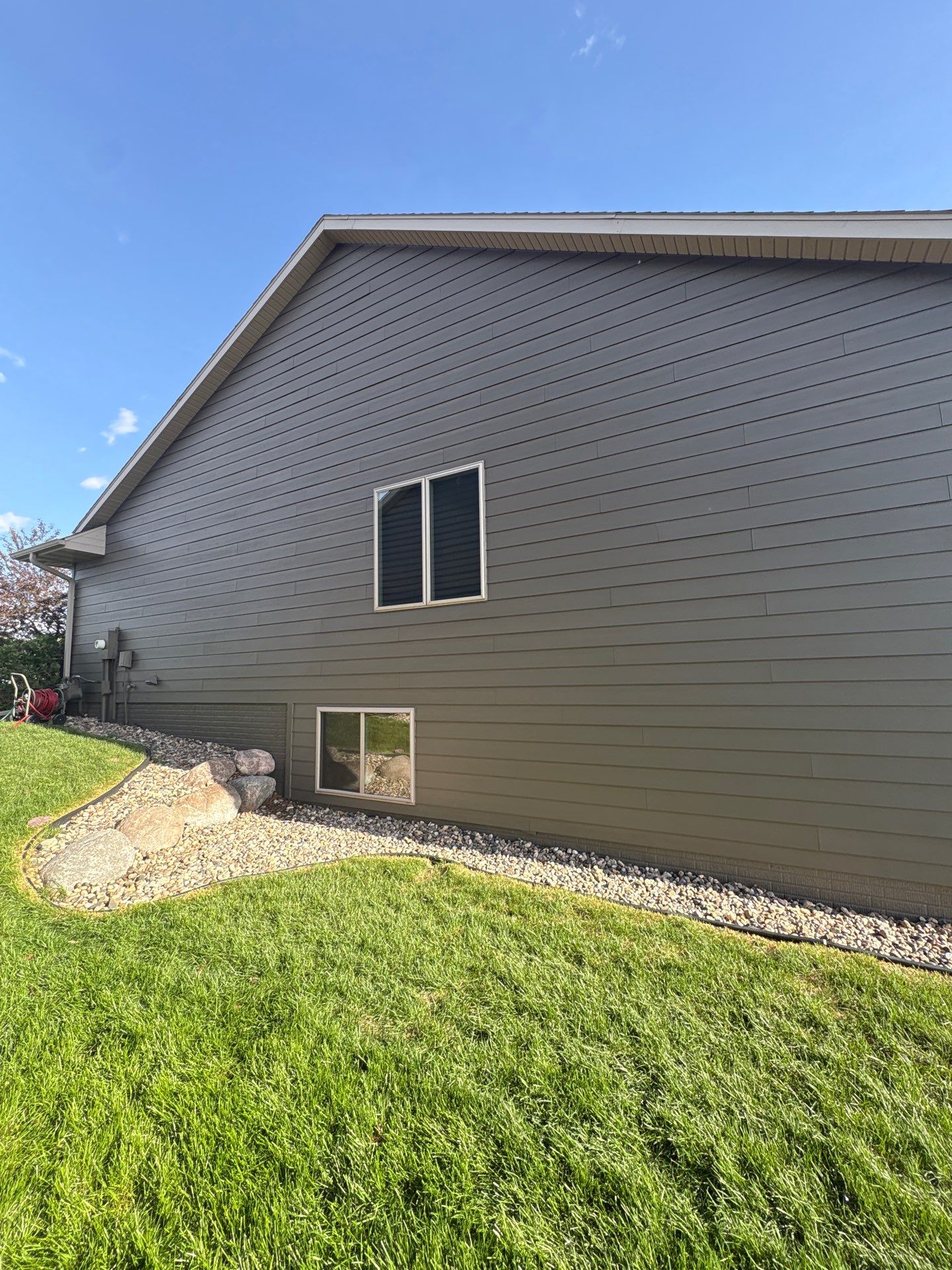 Sioux Falls Residential Exterior Refresh with Fiber Cement Siding by Select Painting, Coatings & Garage Cabinets
