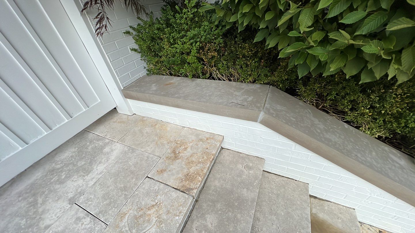 marble patio cleaning and sanding using Polysweep polymeric sand by Northern Power Washing LLC.