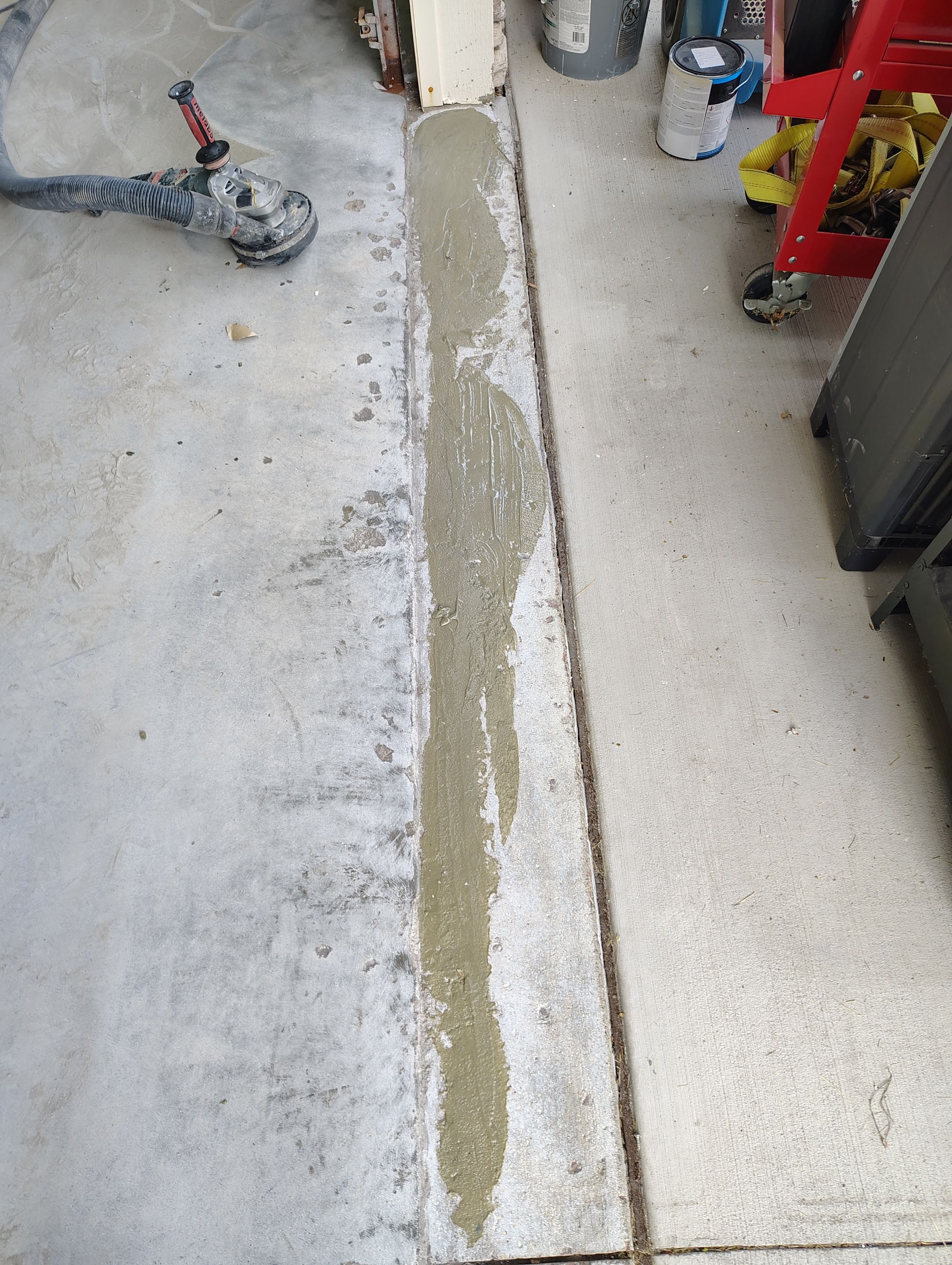 Custom Grey Speckled Epoxy Floor Coating for Sioux Falls Garage by Select Painting, Coatings & Garage Cabinets
