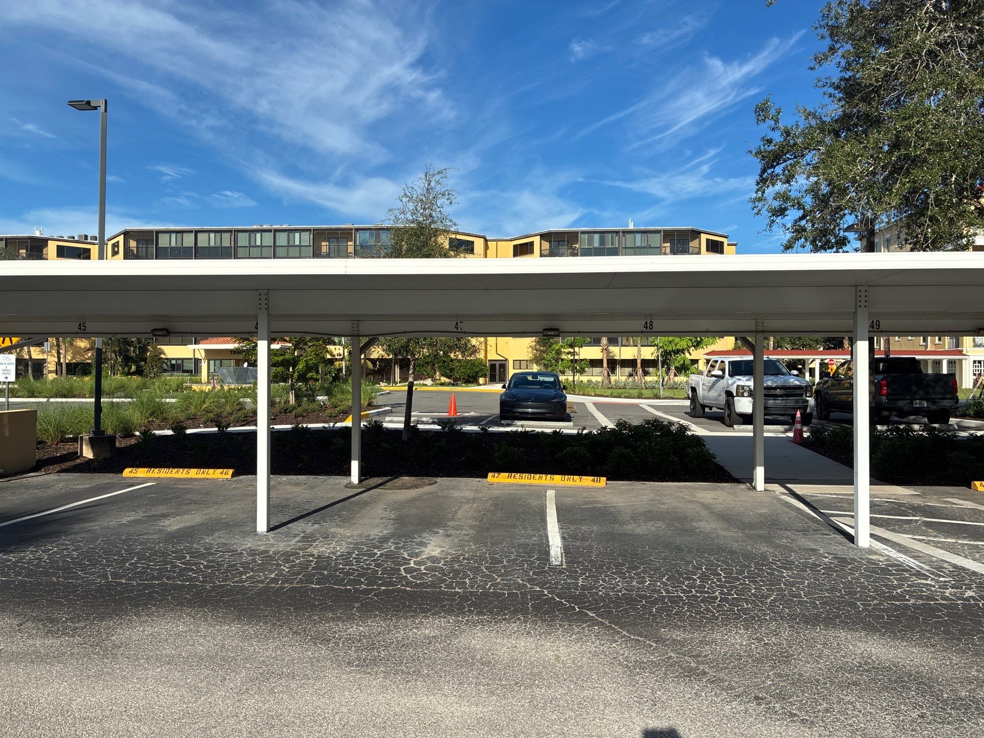 Comprehensive Parking Lot Mill and Overlay with Custom Line Striping in Venice by Everline Coatings & Services - Southwest FL
